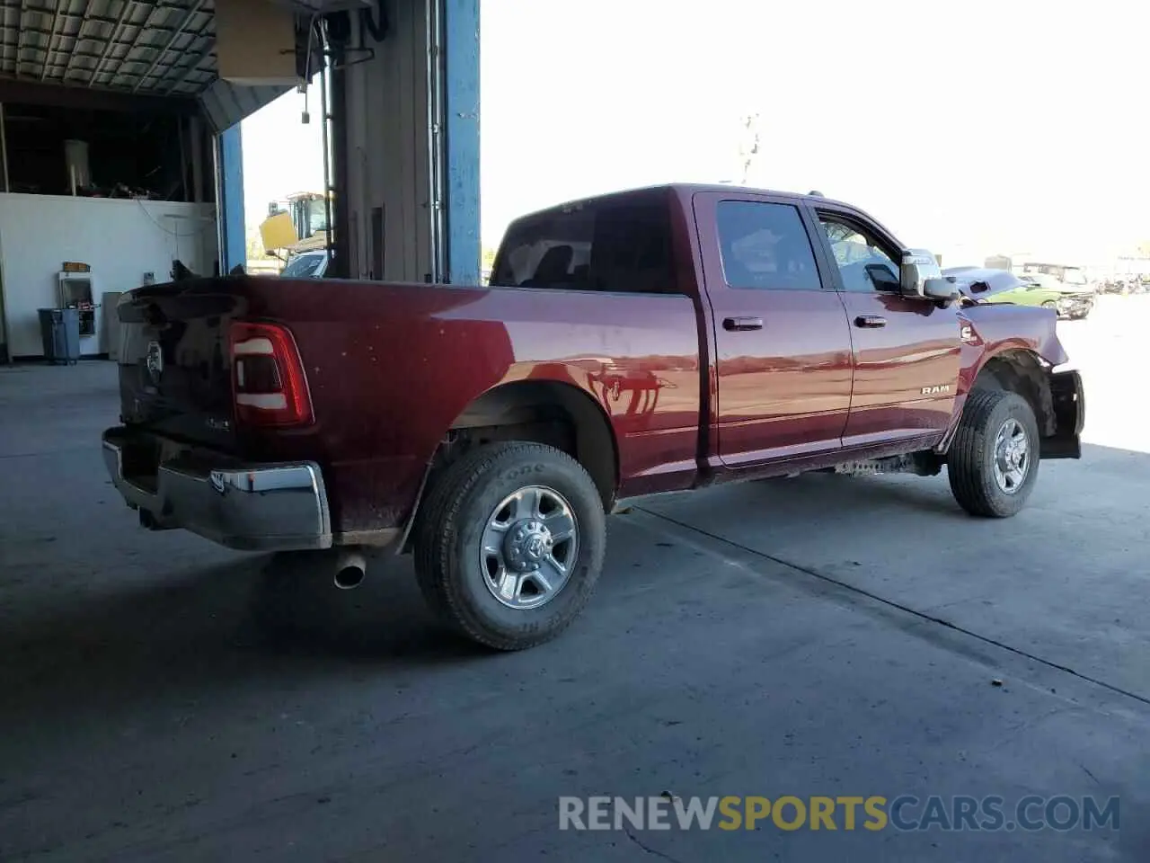 3 Photograph of a damaged car 3C6UR5FL6PG569132 RAM 2500 2023