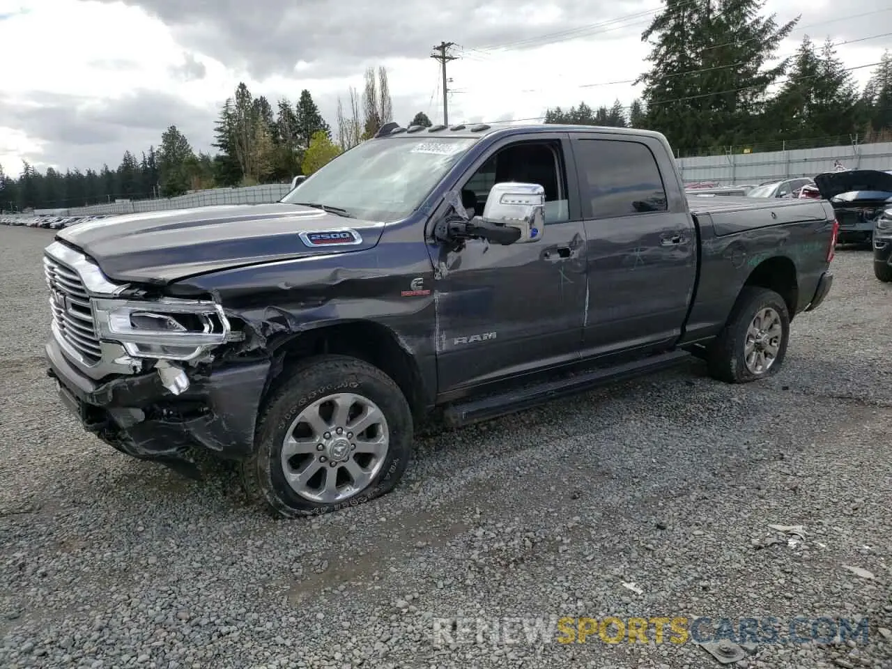 1 Photograph of a damaged car 3C6UR5FL7PG513233 RAM 2500 2023