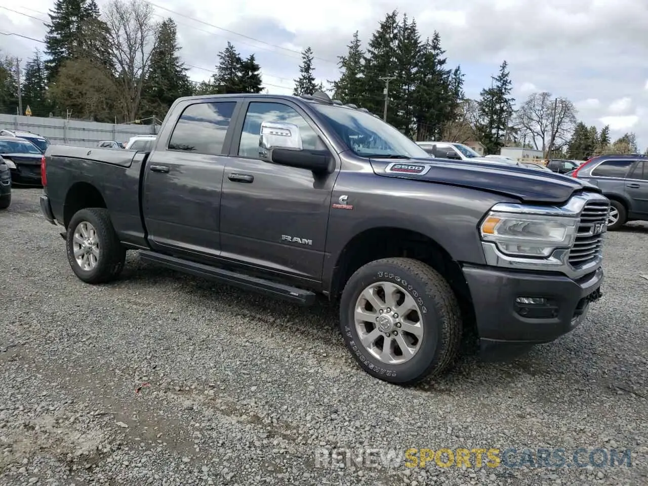 4 Photograph of a damaged car 3C6UR5FL7PG513233 RAM 2500 2023