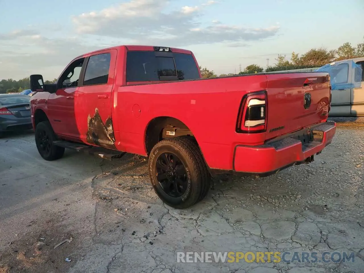 2 Photograph of a damaged car 3C6UR5FL9PG637617 RAM 2500 2023