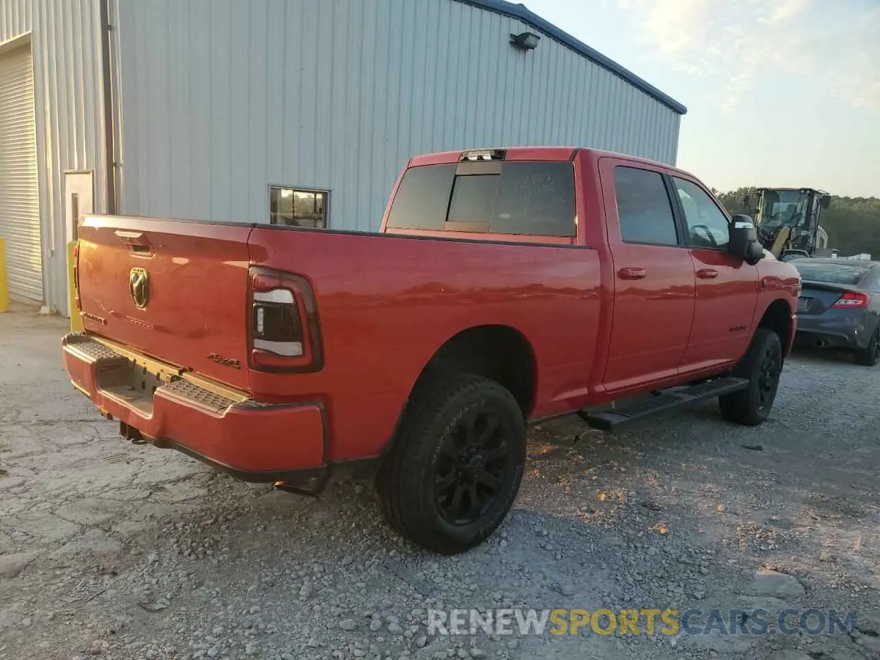 3 Photograph of a damaged car 3C6UR5FL9PG637617 RAM 2500 2023