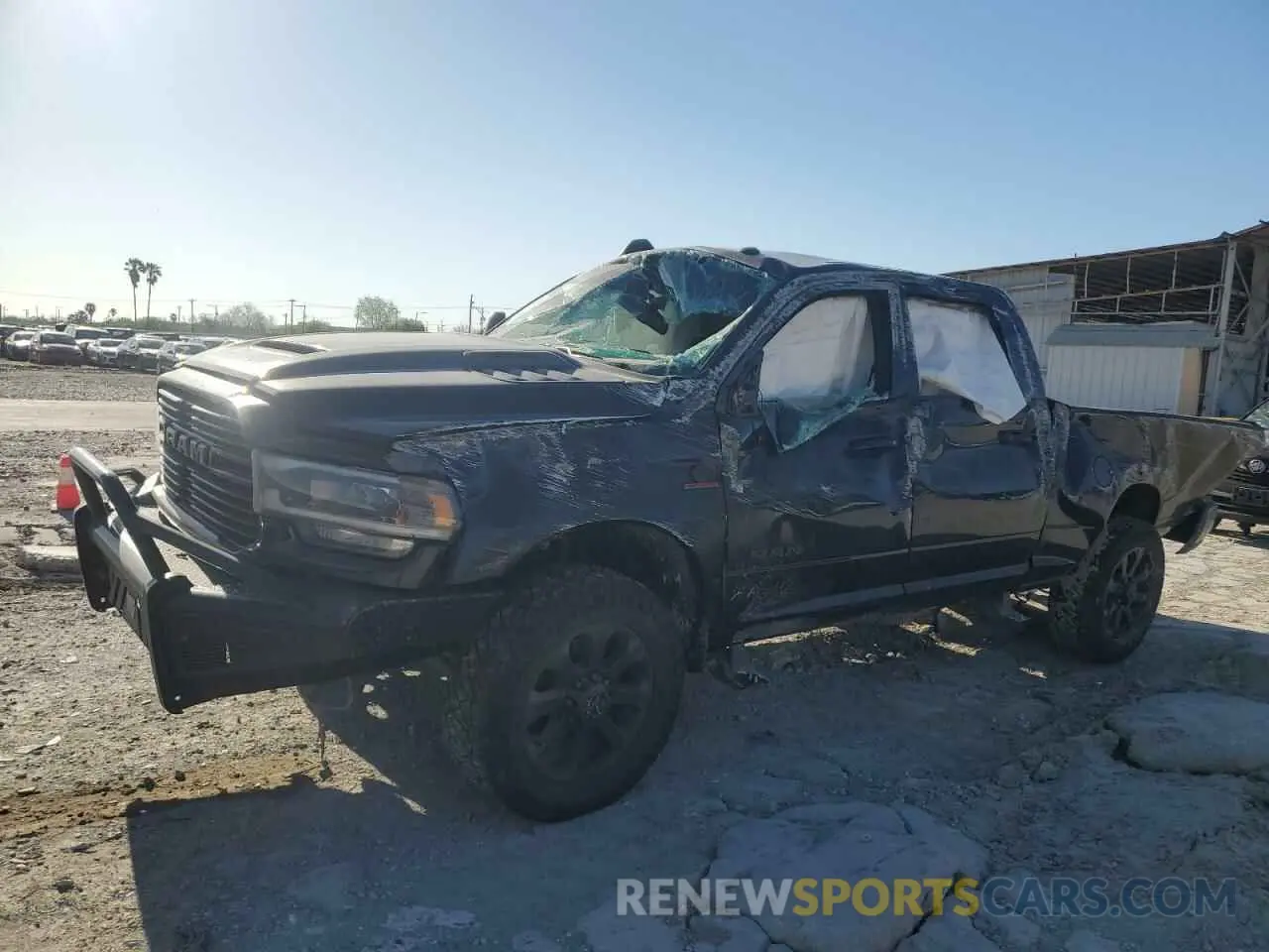1 Photograph of a damaged car 3C6UR5FLXPG618137 RAM 2500 2023
