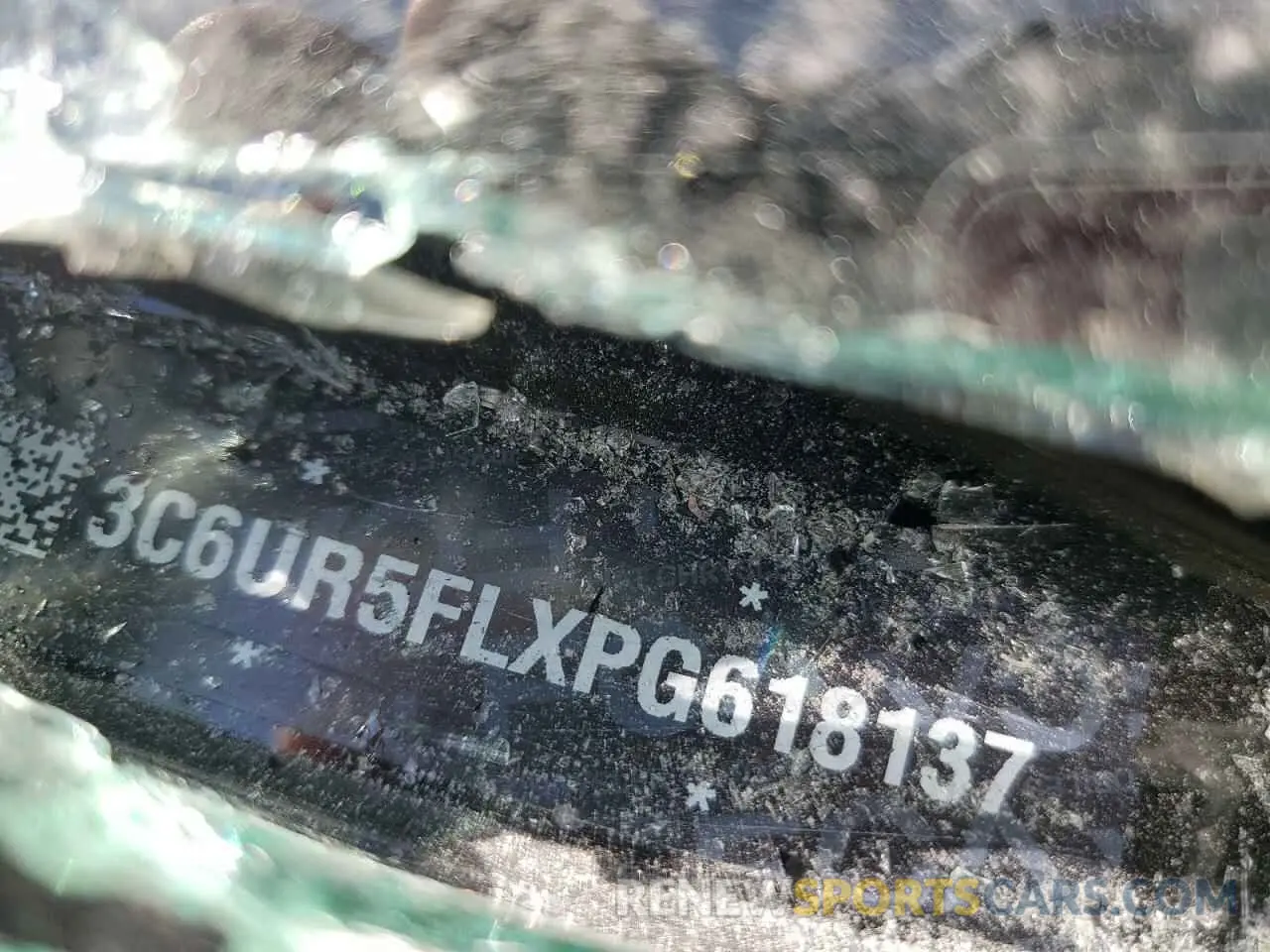 14 Photograph of a damaged car 3C6UR5FLXPG618137 RAM 2500 2023