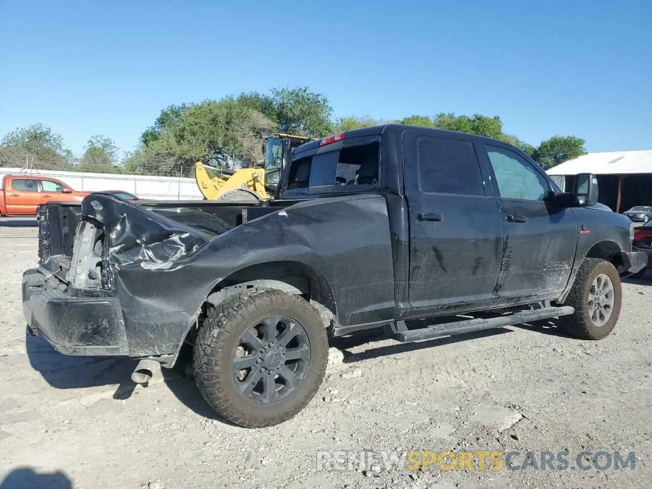 3 Photograph of a damaged car 3C6UR5FLXPG618137 RAM 2500 2023