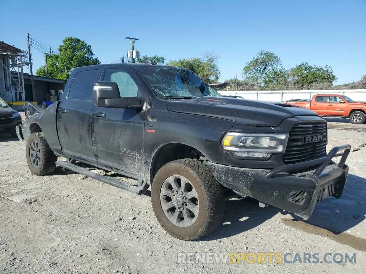 4 Photograph of a damaged car 3C6UR5FLXPG618137 RAM 2500 2023