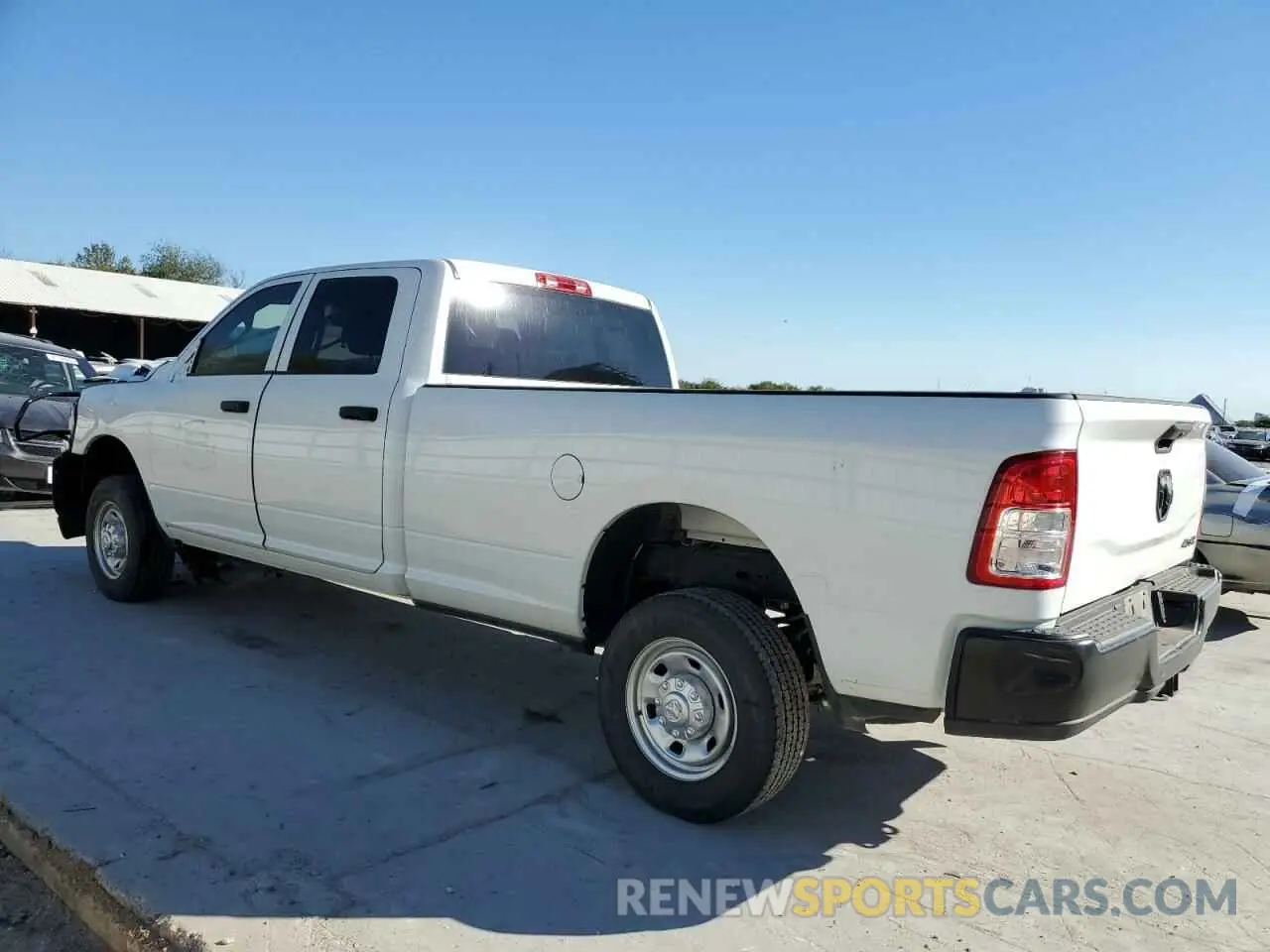 2 Photograph of a damaged car 3C6UR5HJ0PG610057 RAM 2500 2023