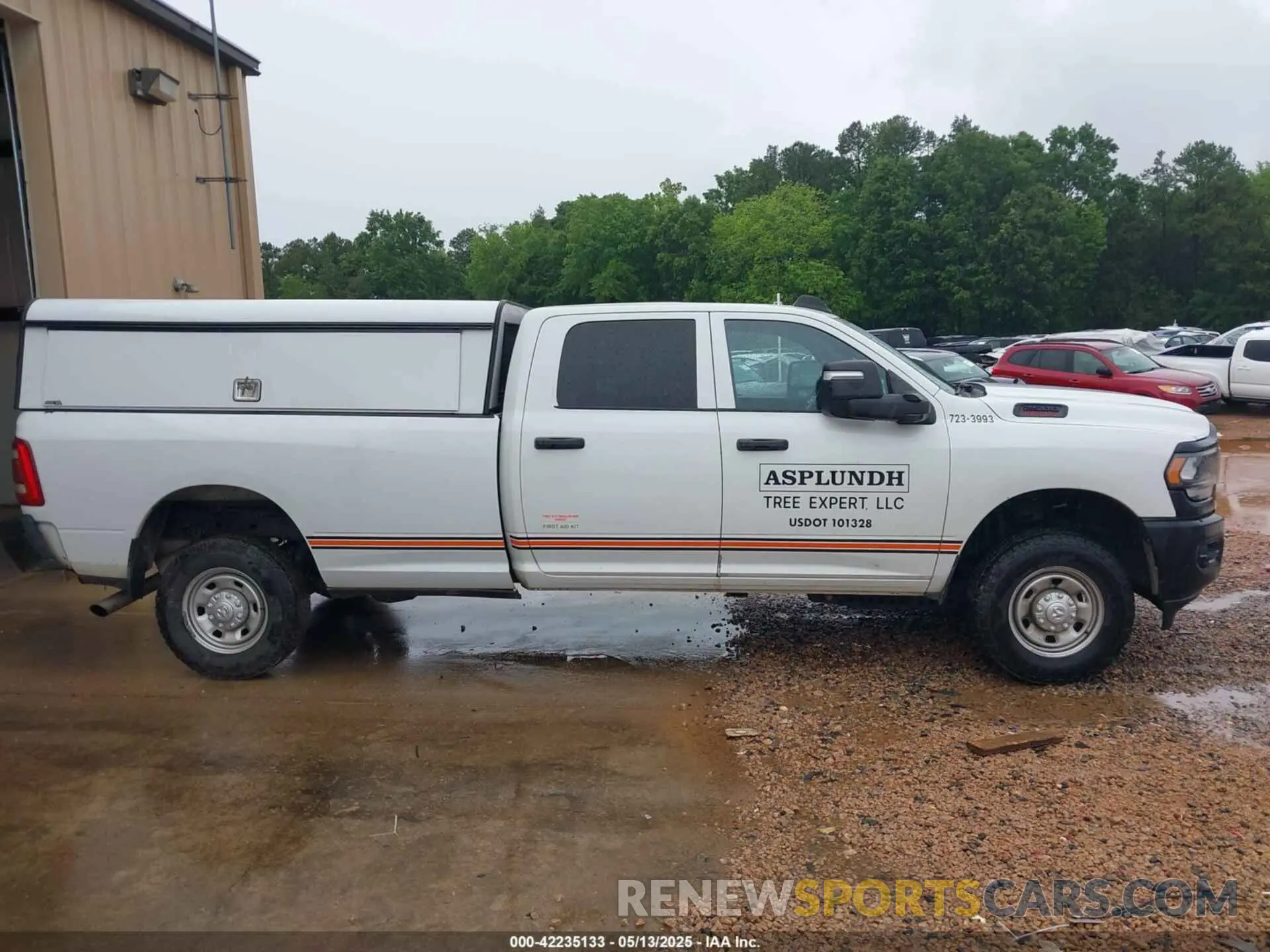 13 Photograph of a damaged car 3C6UR5HJ4PG536920 RAM 2500 2023