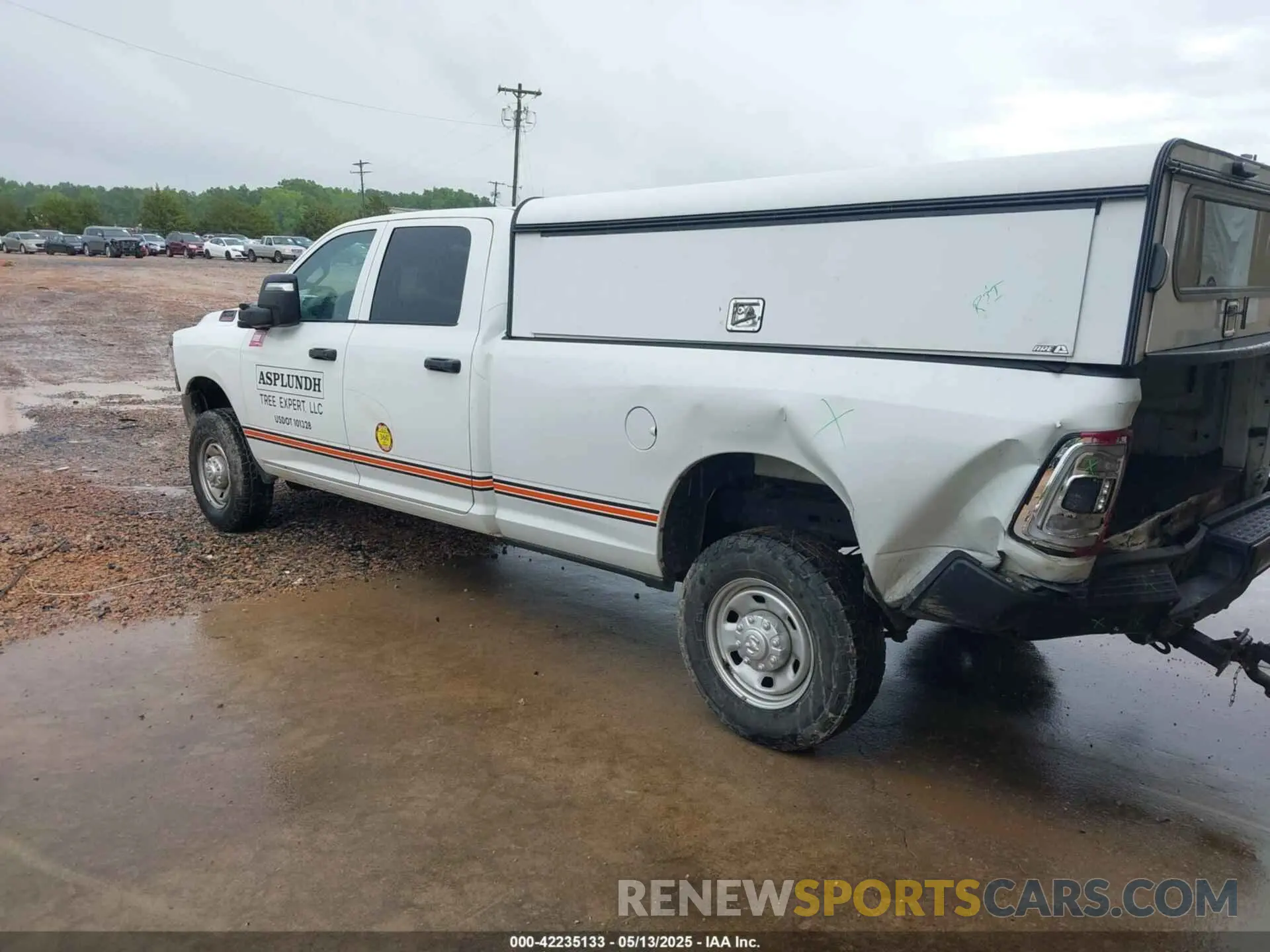 3 Photograph of a damaged car 3C6UR5HJ4PG536920 RAM 2500 2023