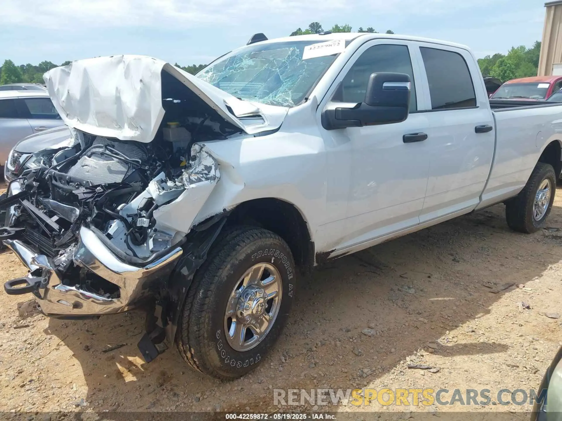 2 Photograph of a damaged car 3C6UR5HJ5PG537025 RAM 2500 2023