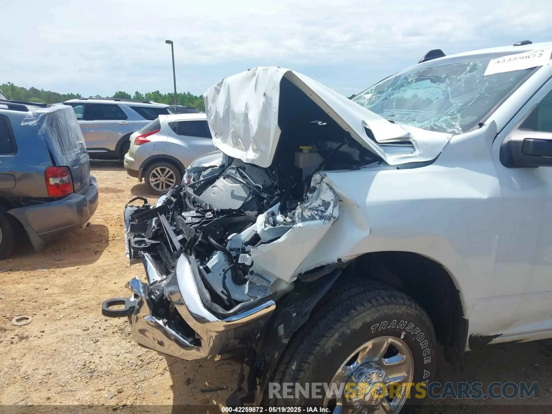 6 Photograph of a damaged car 3C6UR5HJ5PG537025 RAM 2500 2023
