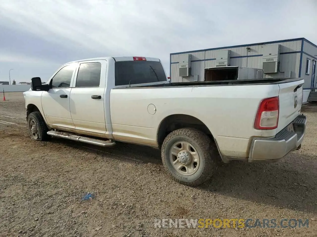 2 Photograph of a damaged car 3C6UR5HJ6PG500730 RAM 2500 2023