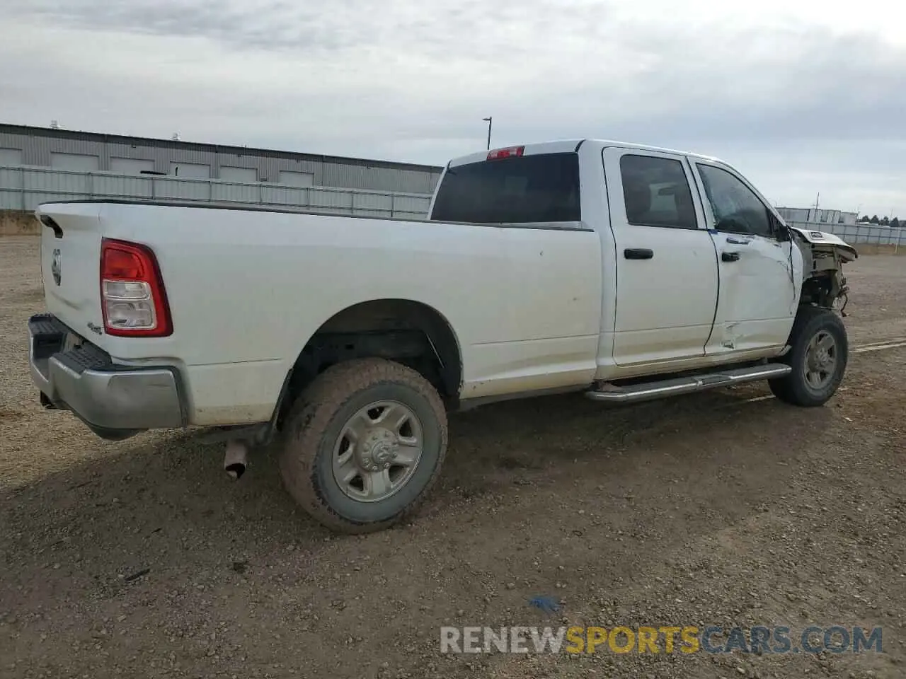 3 Photograph of a damaged car 3C6UR5HJ6PG500730 RAM 2500 2023
