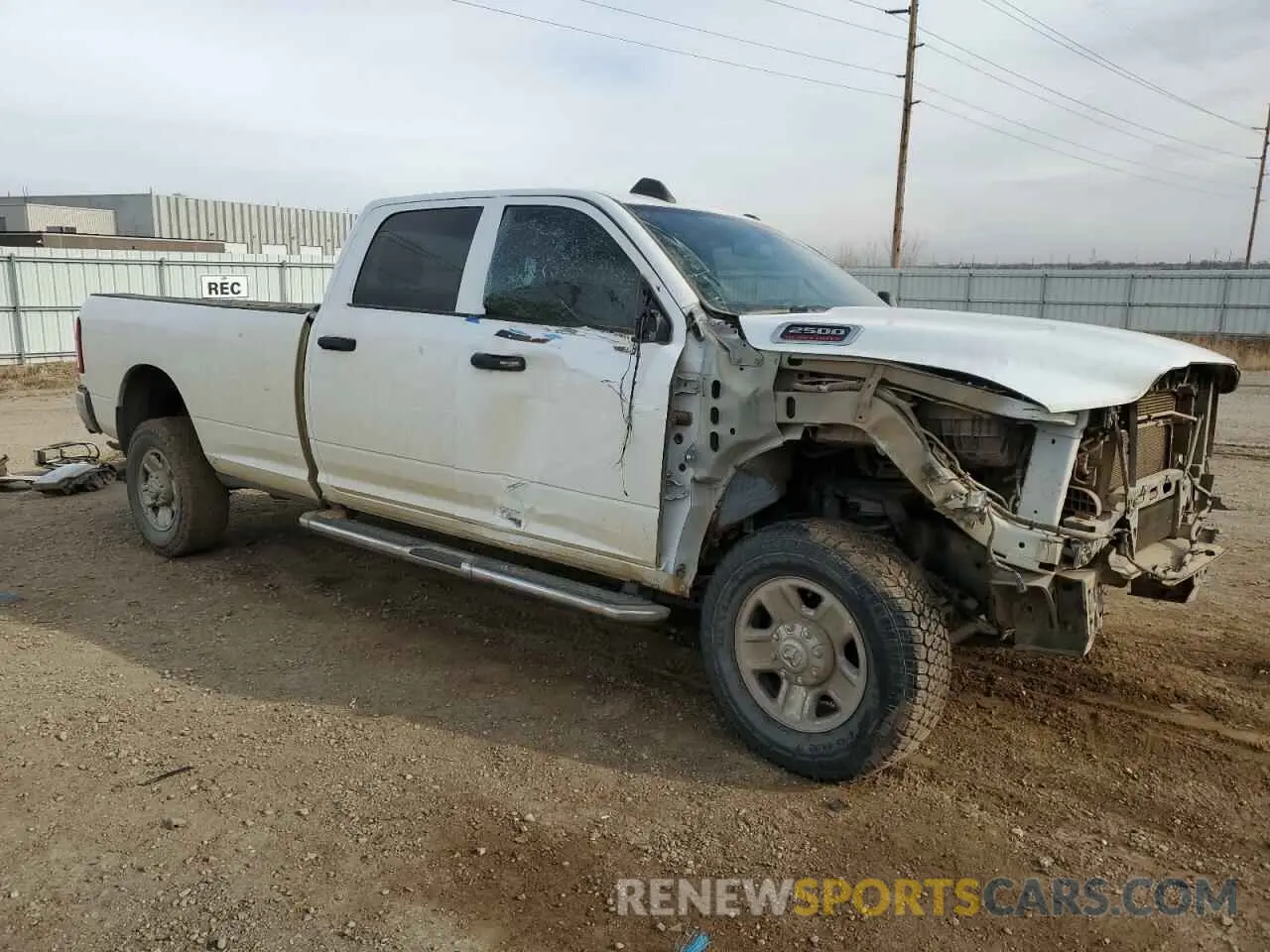 4 Photograph of a damaged car 3C6UR5HJ6PG500730 RAM 2500 2023