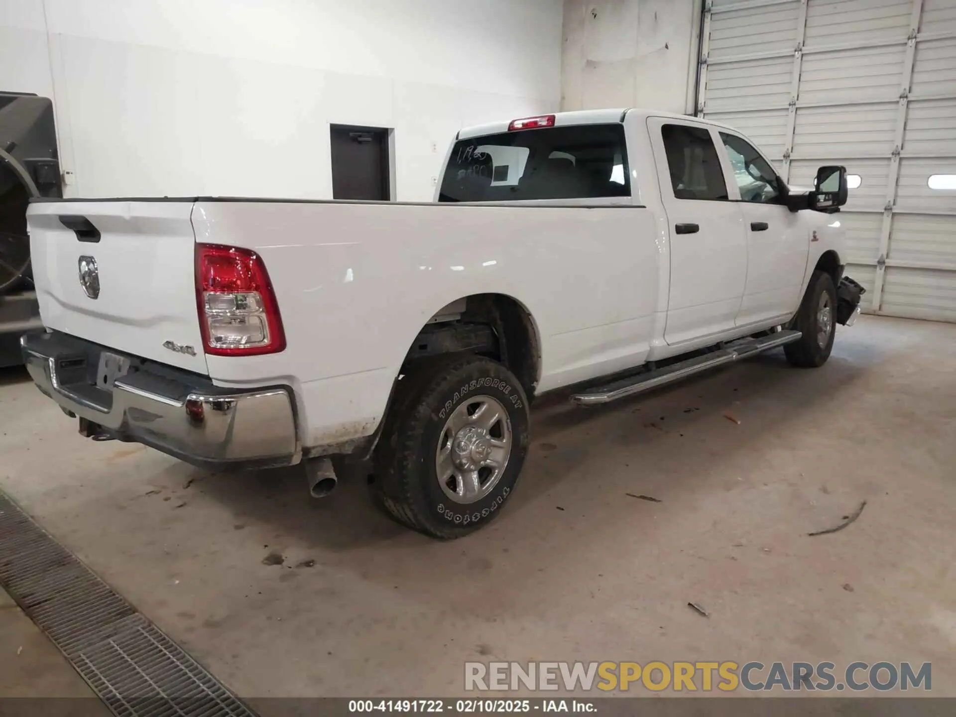 4 Photograph of a damaged car 3C6UR5HL0PG529660 RAM 2500 2023