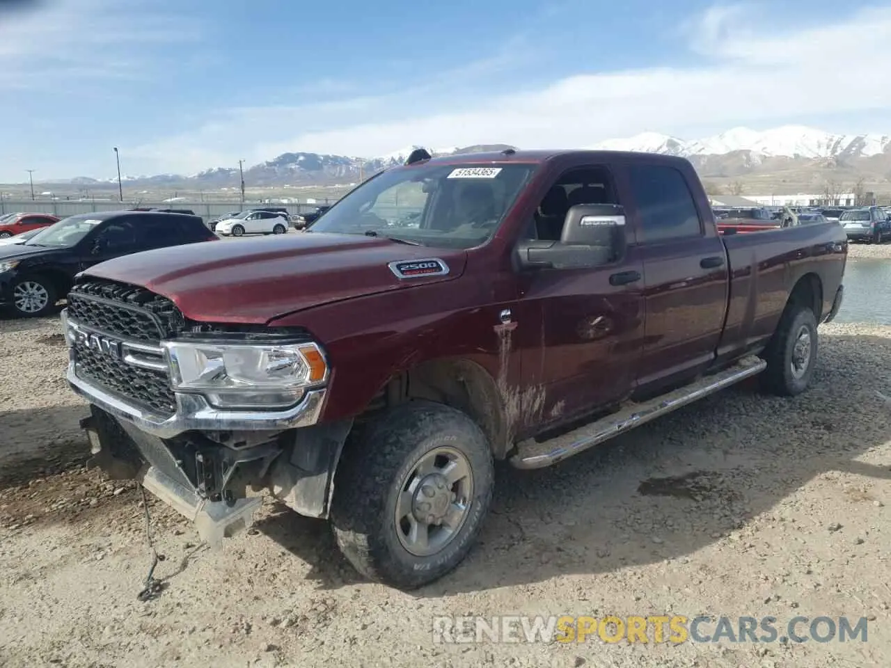 1 Photograph of a damaged car 3C6UR5HL2PG540031 RAM 2500 2023