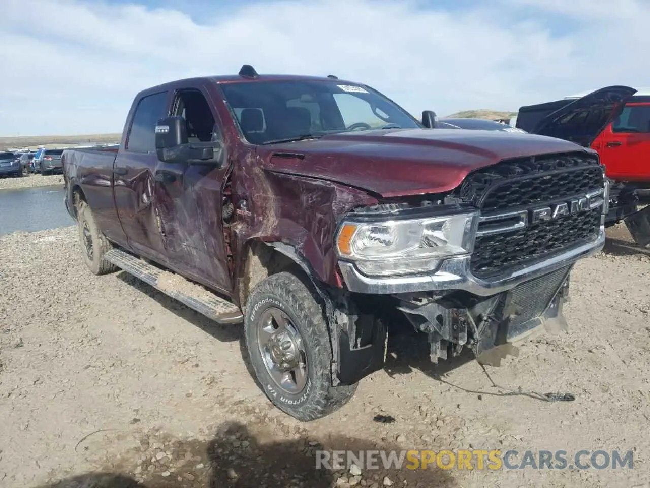 4 Photograph of a damaged car 3C6UR5HL2PG540031 RAM 2500 2023