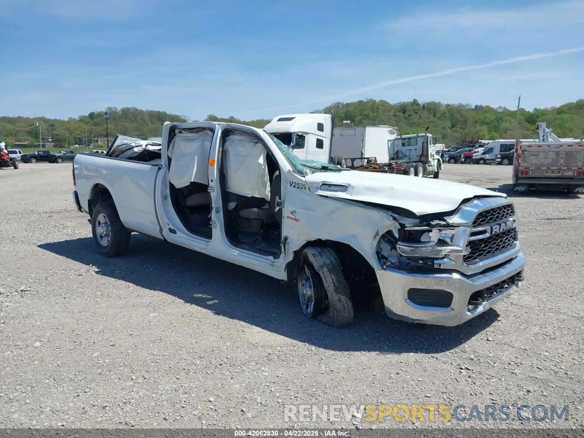 1 Photograph of a damaged car 3C6UR5HL3PG529636 RAM 2500 2023