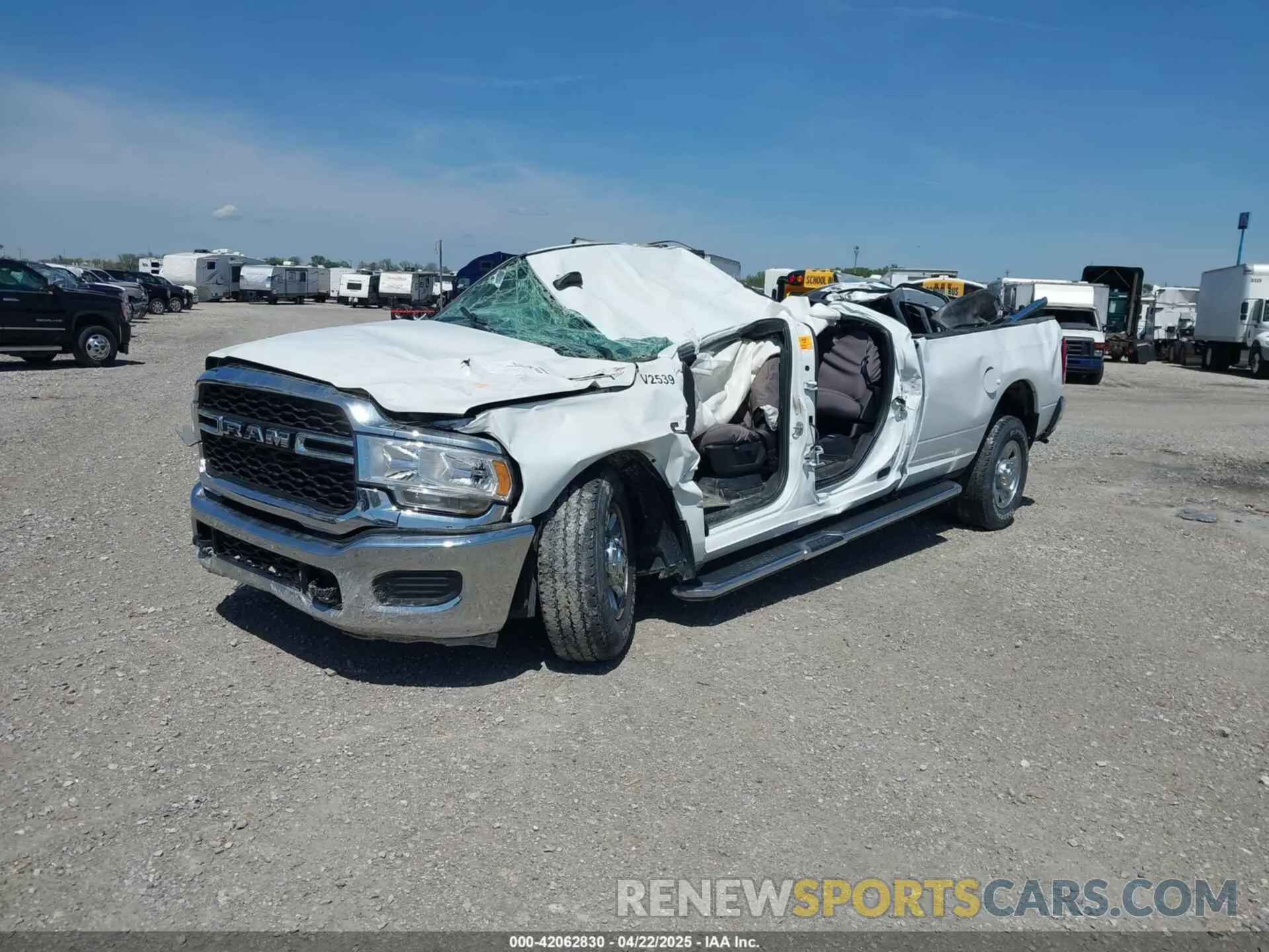 2 Photograph of a damaged car 3C6UR5HL3PG529636 RAM 2500 2023