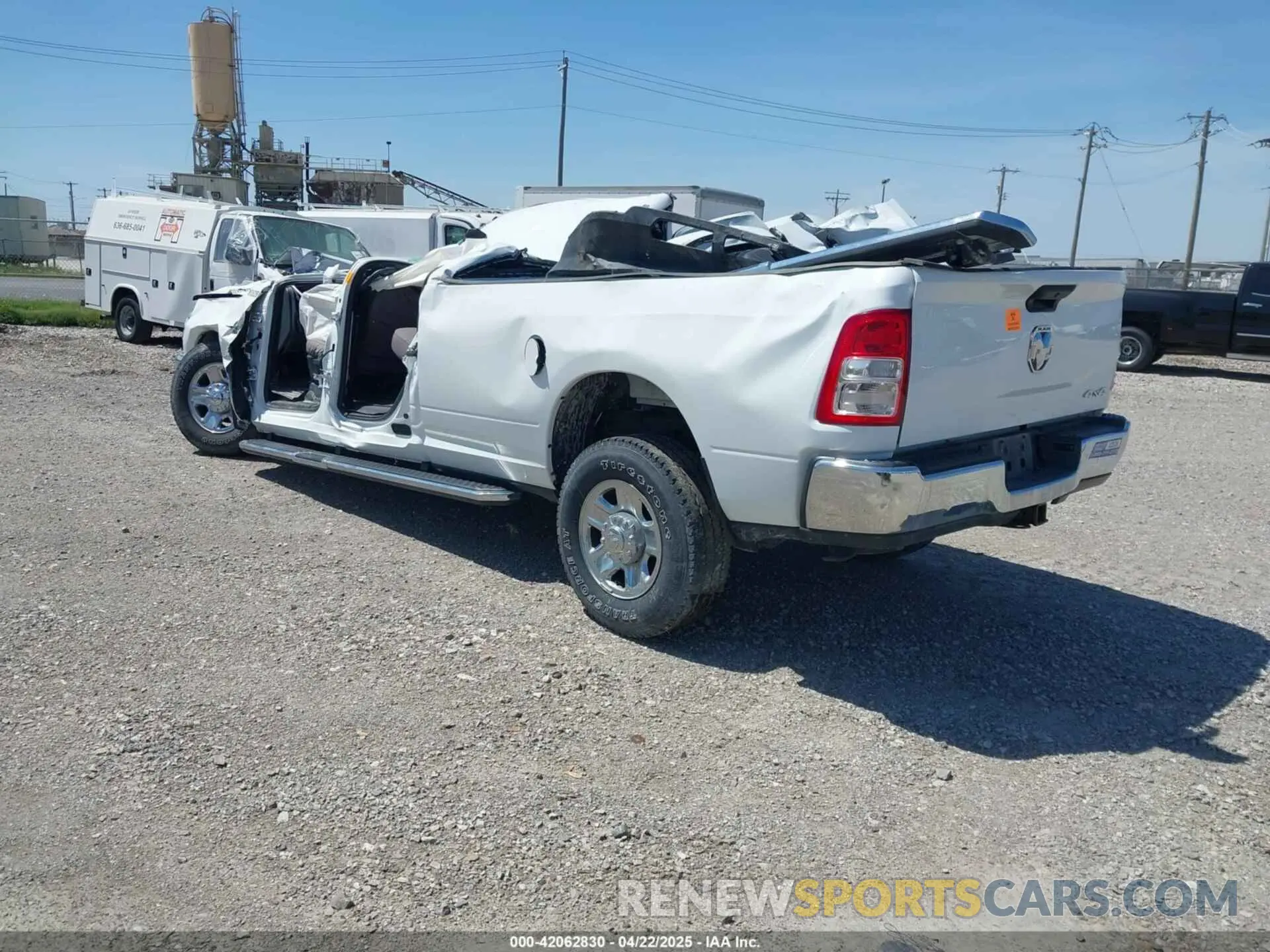 3 Photograph of a damaged car 3C6UR5HL3PG529636 RAM 2500 2023
