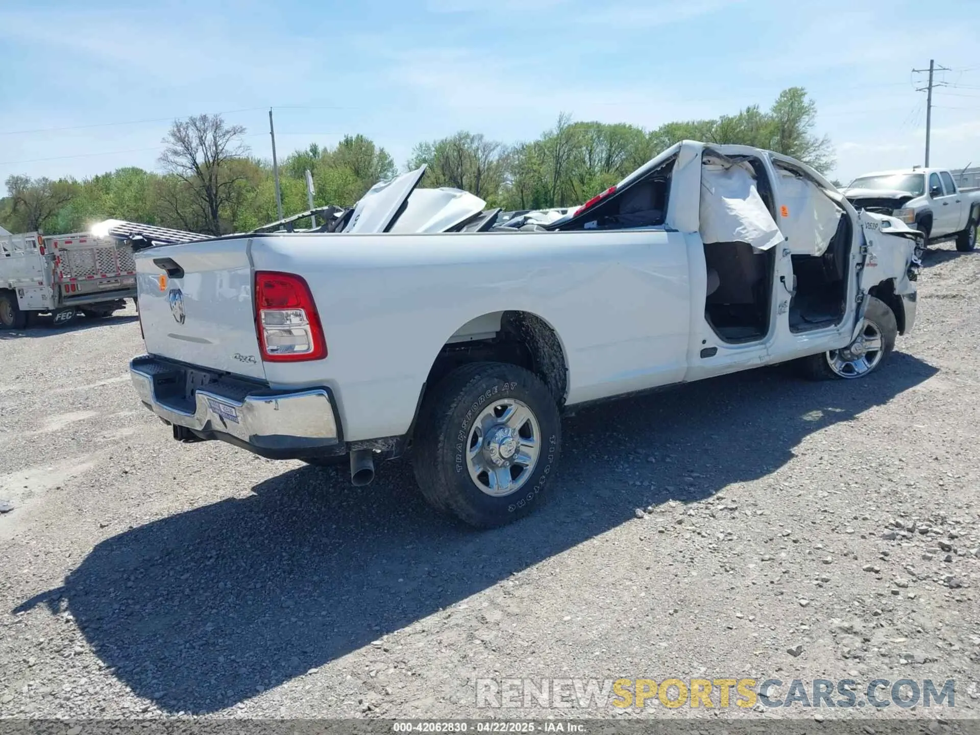 4 Photograph of a damaged car 3C6UR5HL3PG529636 RAM 2500 2023
