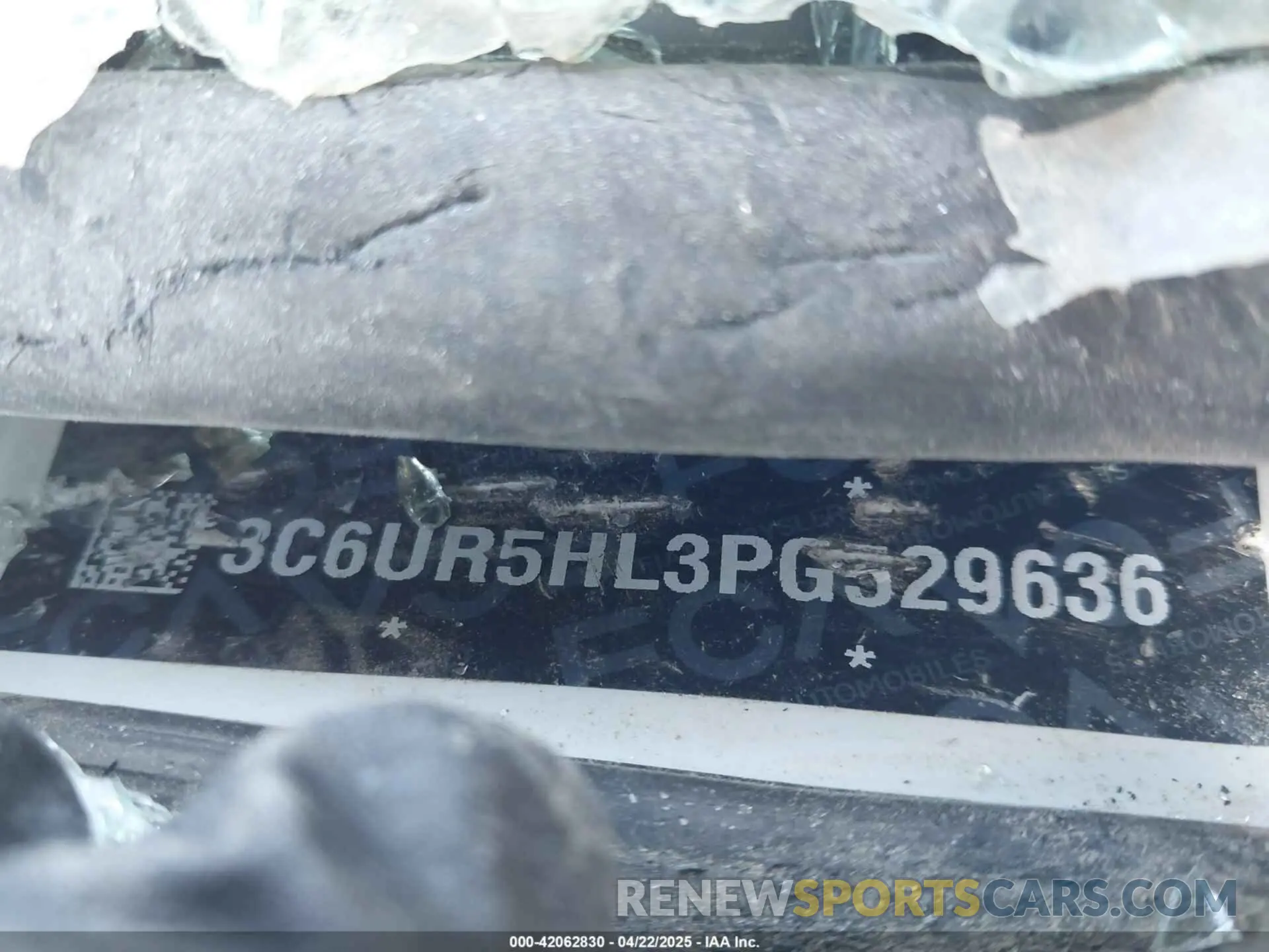 9 Photograph of a damaged car 3C6UR5HL3PG529636 RAM 2500 2023