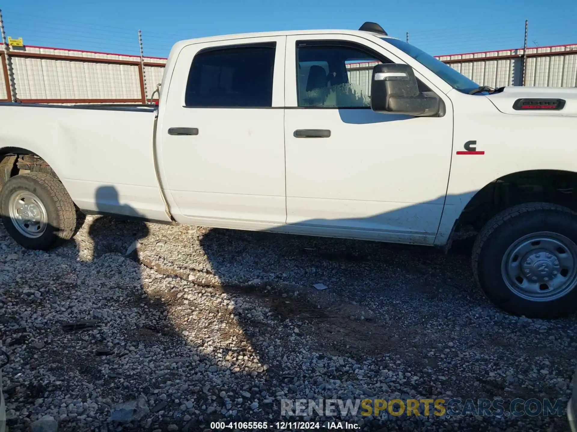 13 Photograph of a damaged car 3C6UR5HL4PG506690 RAM 2500 2023