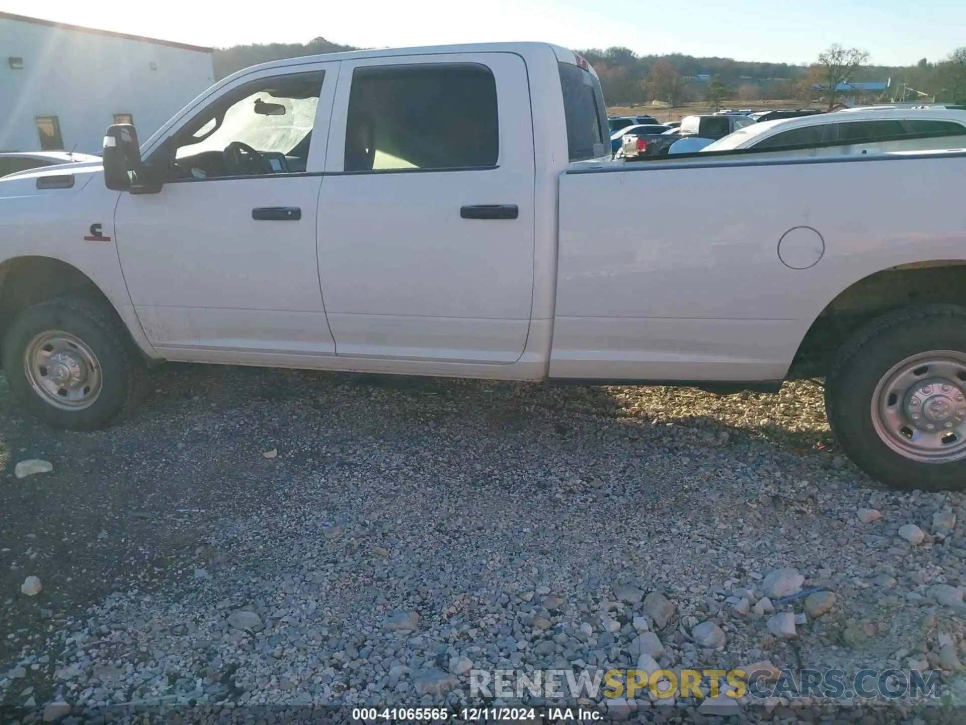 14 Photograph of a damaged car 3C6UR5HL4PG506690 RAM 2500 2023