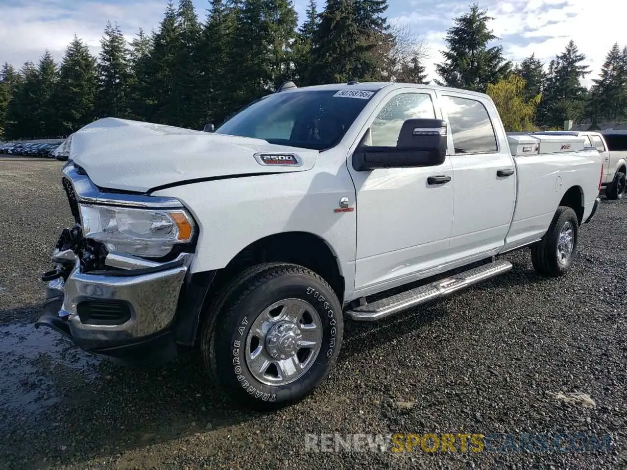 1 Photograph of a damaged car 3C6UR5HL6PG586932 RAM 2500 2023
