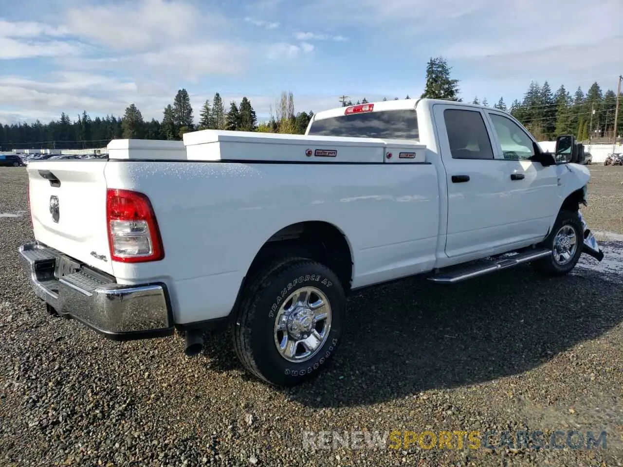 3 Photograph of a damaged car 3C6UR5HL6PG586932 RAM 2500 2023