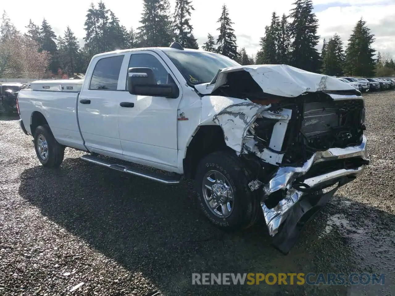 4 Photograph of a damaged car 3C6UR5HL6PG586932 RAM 2500 2023