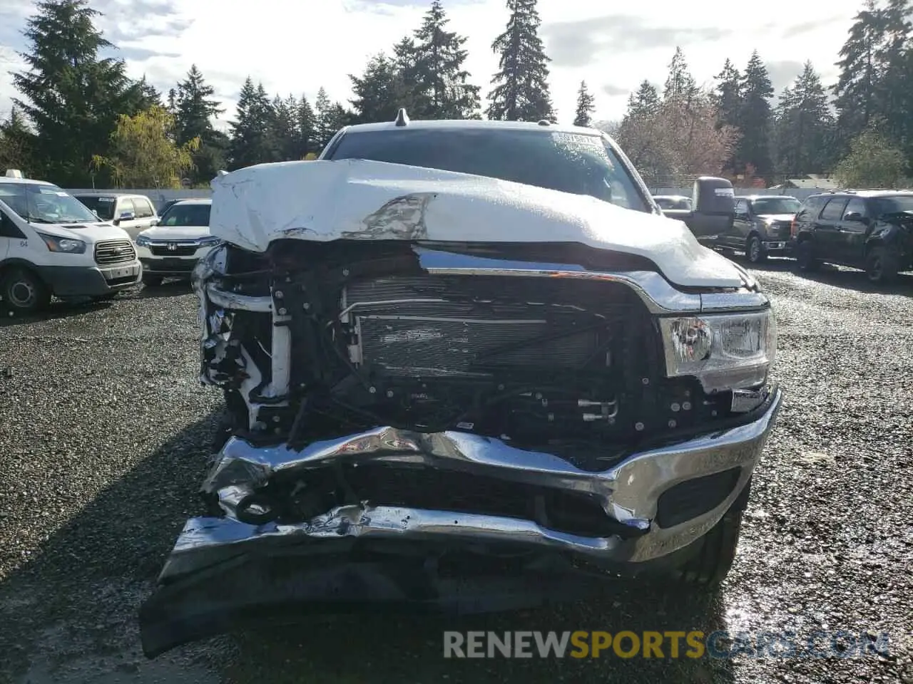 5 Photograph of a damaged car 3C6UR5HL6PG586932 RAM 2500 2023
