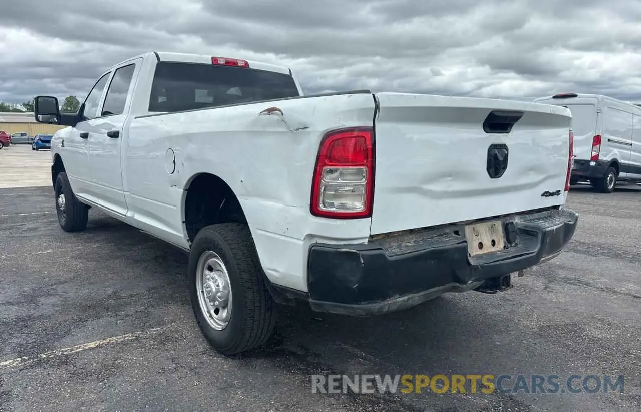 3 Photograph of a damaged car 3C6UR5HL8PG652719 RAM 2500 2023
