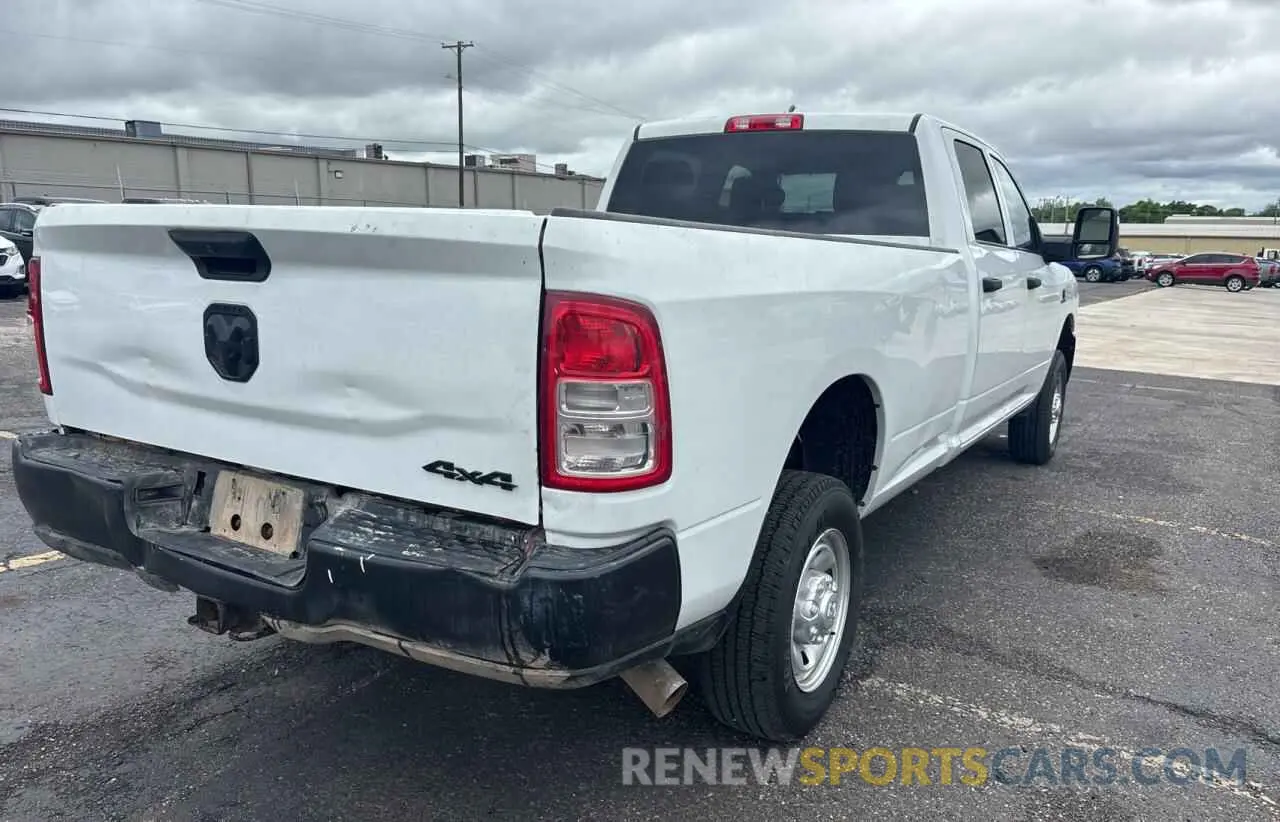 4 Photograph of a damaged car 3C6UR5HL8PG652719 RAM 2500 2023