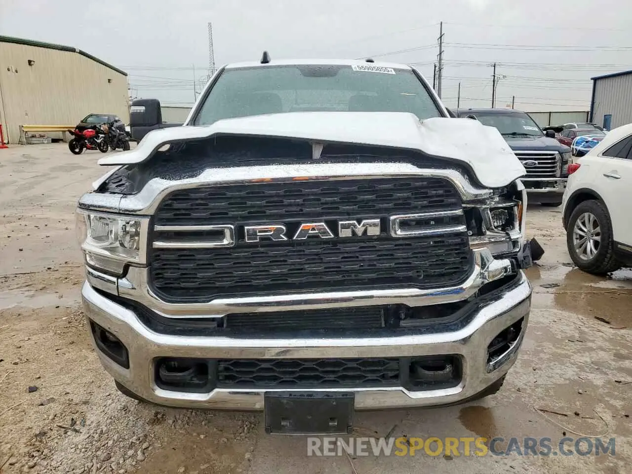 5 Photograph of a damaged car 3C6UR5JL3PG576451 RAM 2500 2023