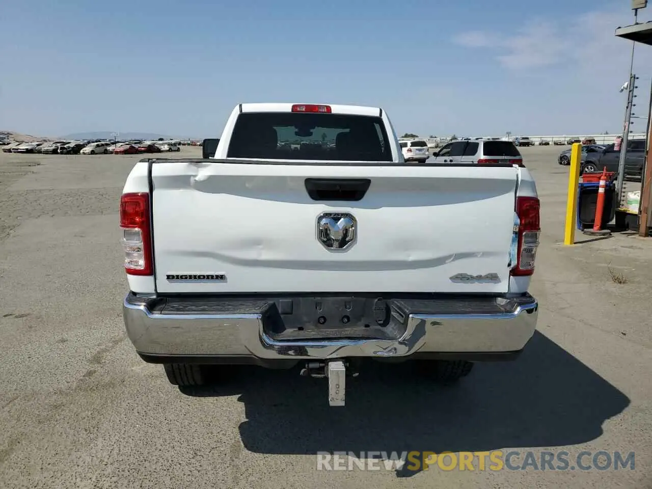 6 Photograph of a damaged car 3C6UR5JL9PG600980 RAM 2500 2023