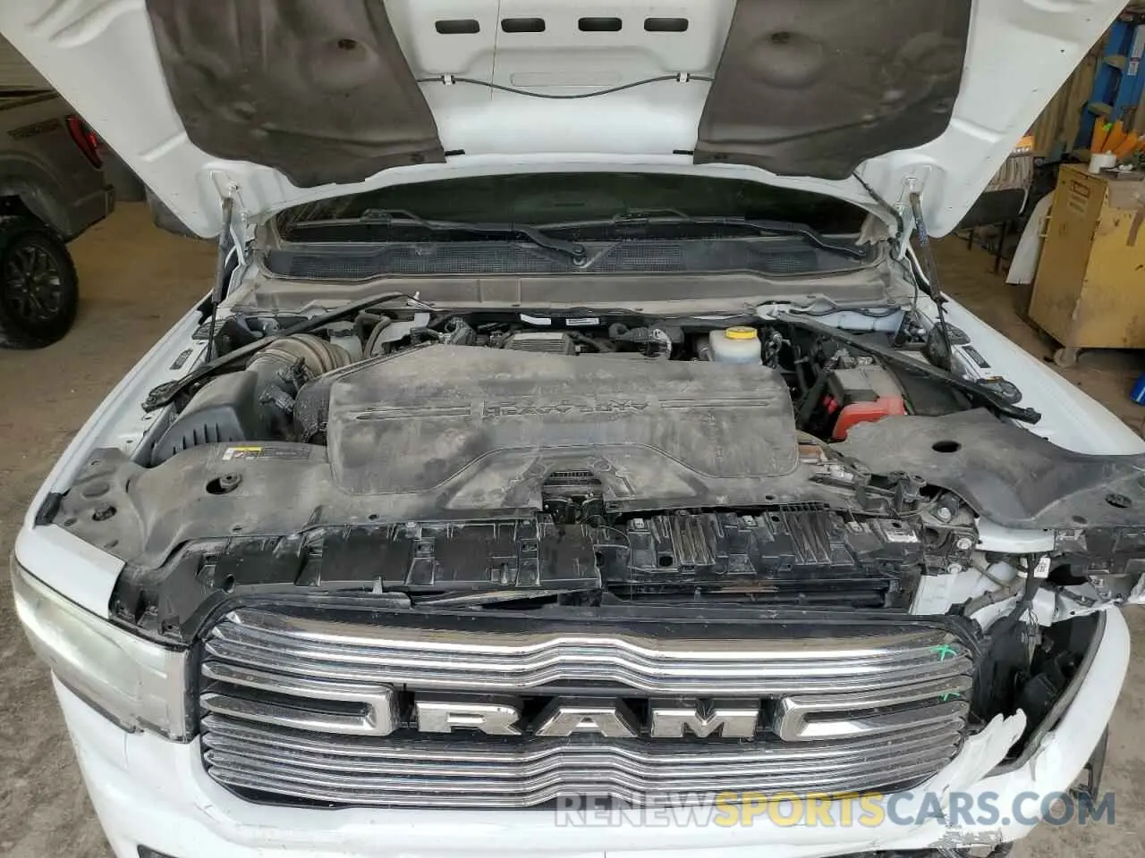 11 Photograph of a damaged car 3C6UR5KL4PG549631 RAM 2500 2023