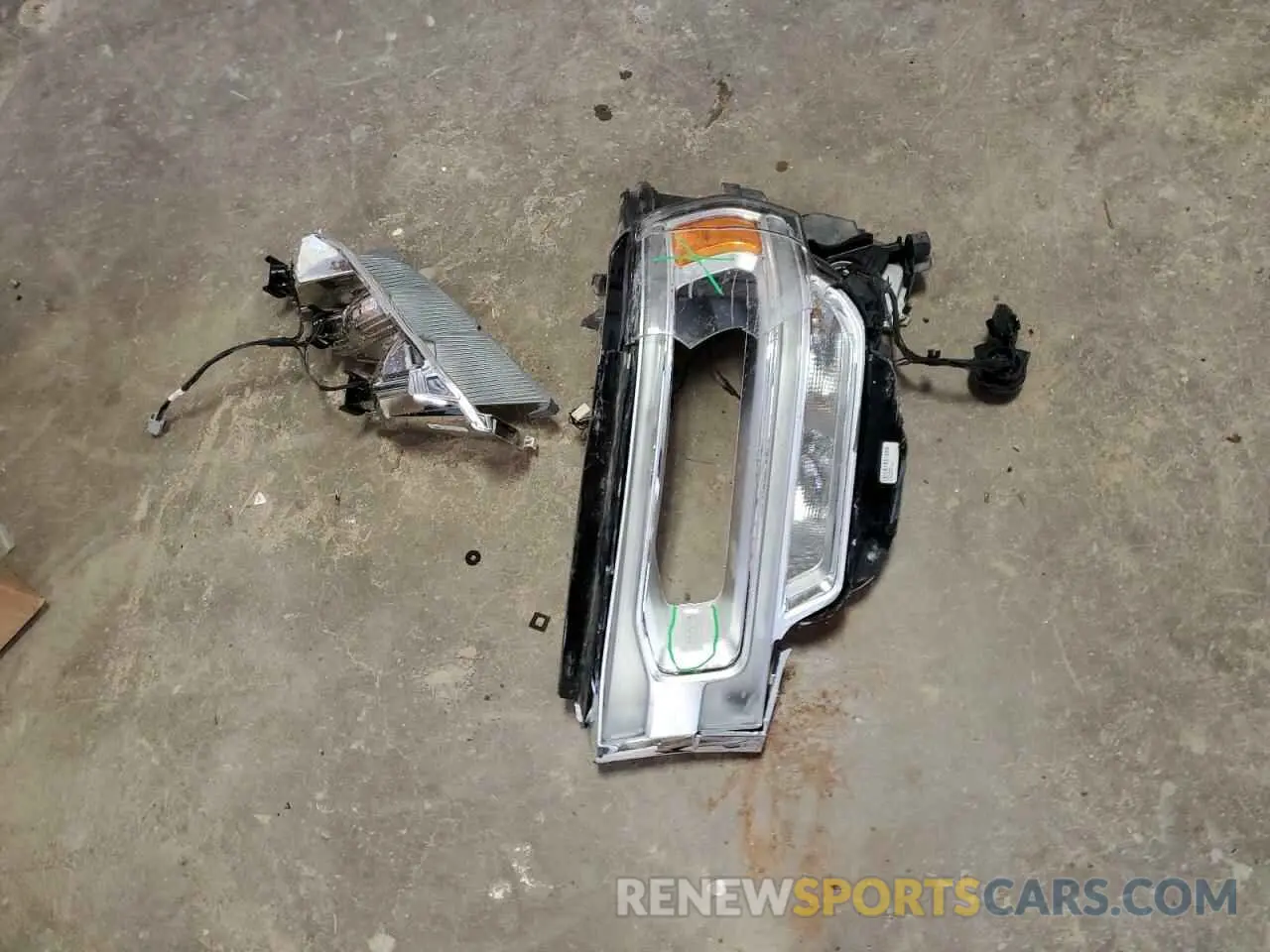 12 Photograph of a damaged car 3C6UR5KL4PG549631 RAM 2500 2023