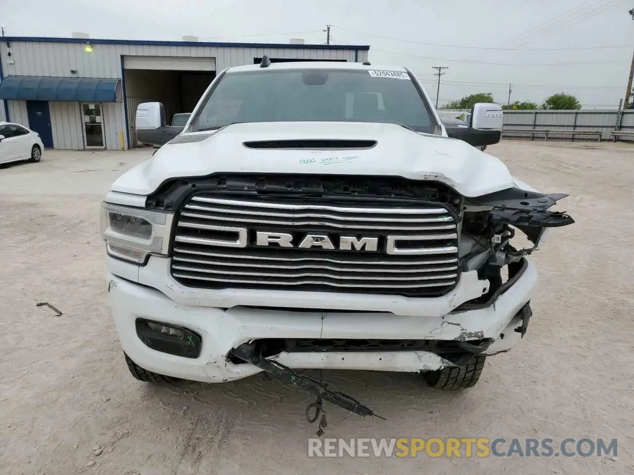 5 Photograph of a damaged car 3C6UR5KL4PG549631 RAM 2500 2023