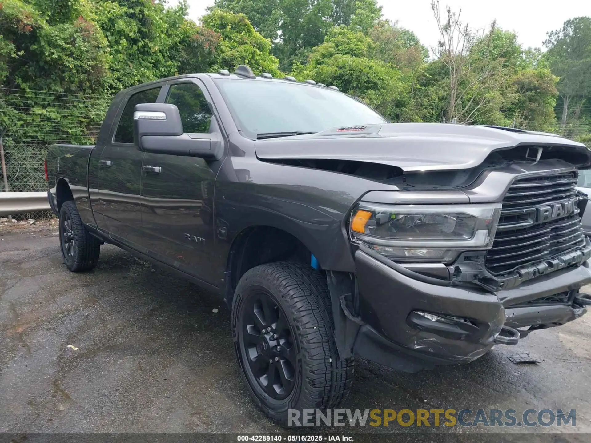 1 Photograph of a damaged car 3C6UR5NJ7PG523857 RAM 2500 2023
