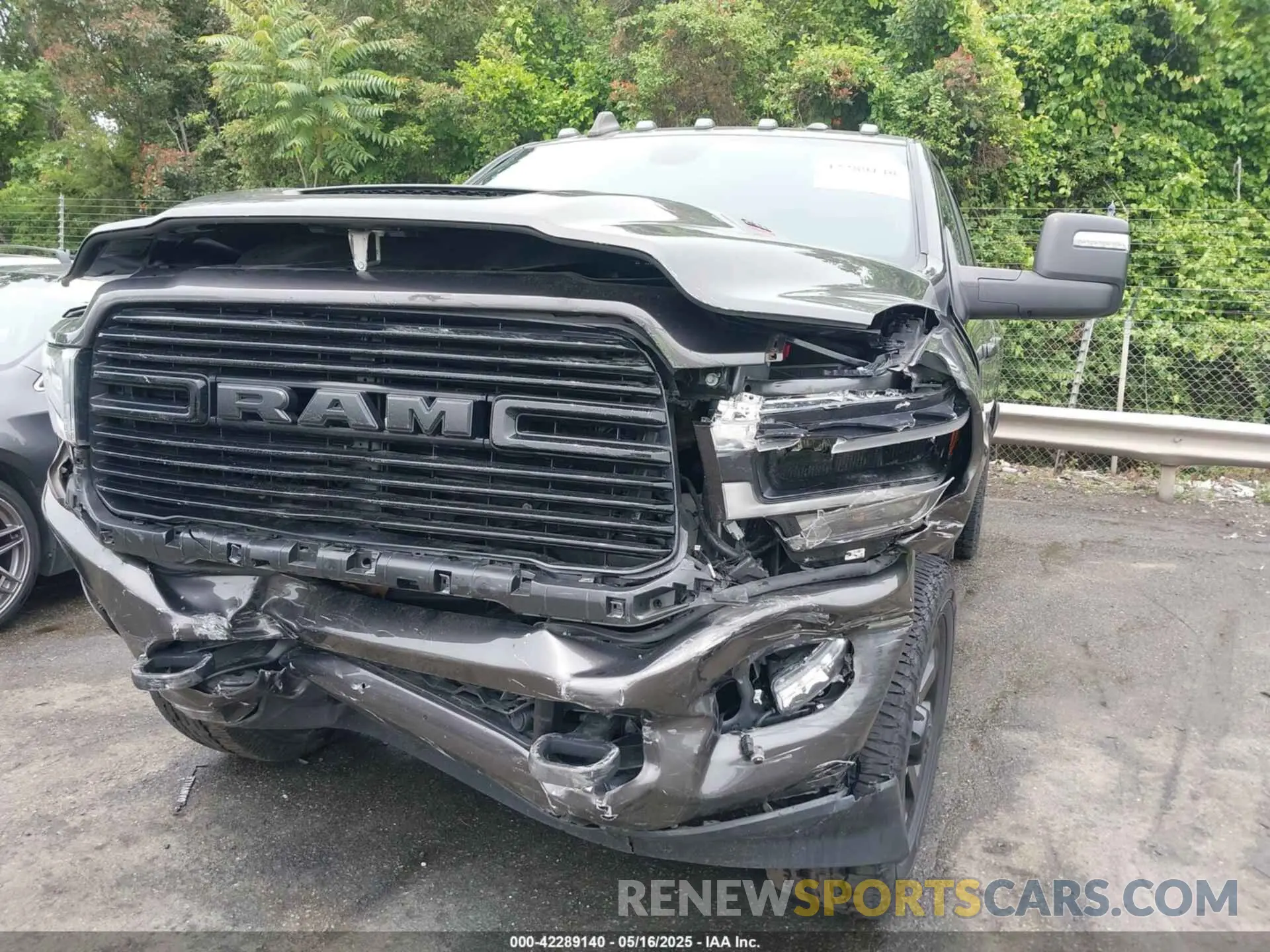 6 Photograph of a damaged car 3C6UR5NJ7PG523857 RAM 2500 2023