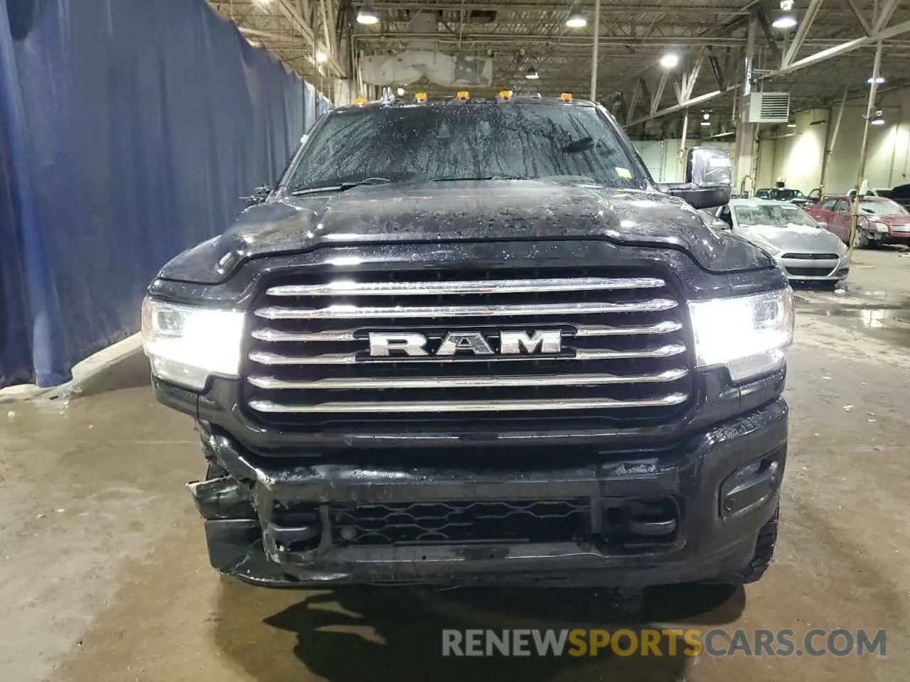 5 Photograph of a damaged car 3C6UR5PL8PG591647 RAM 2500 2023
