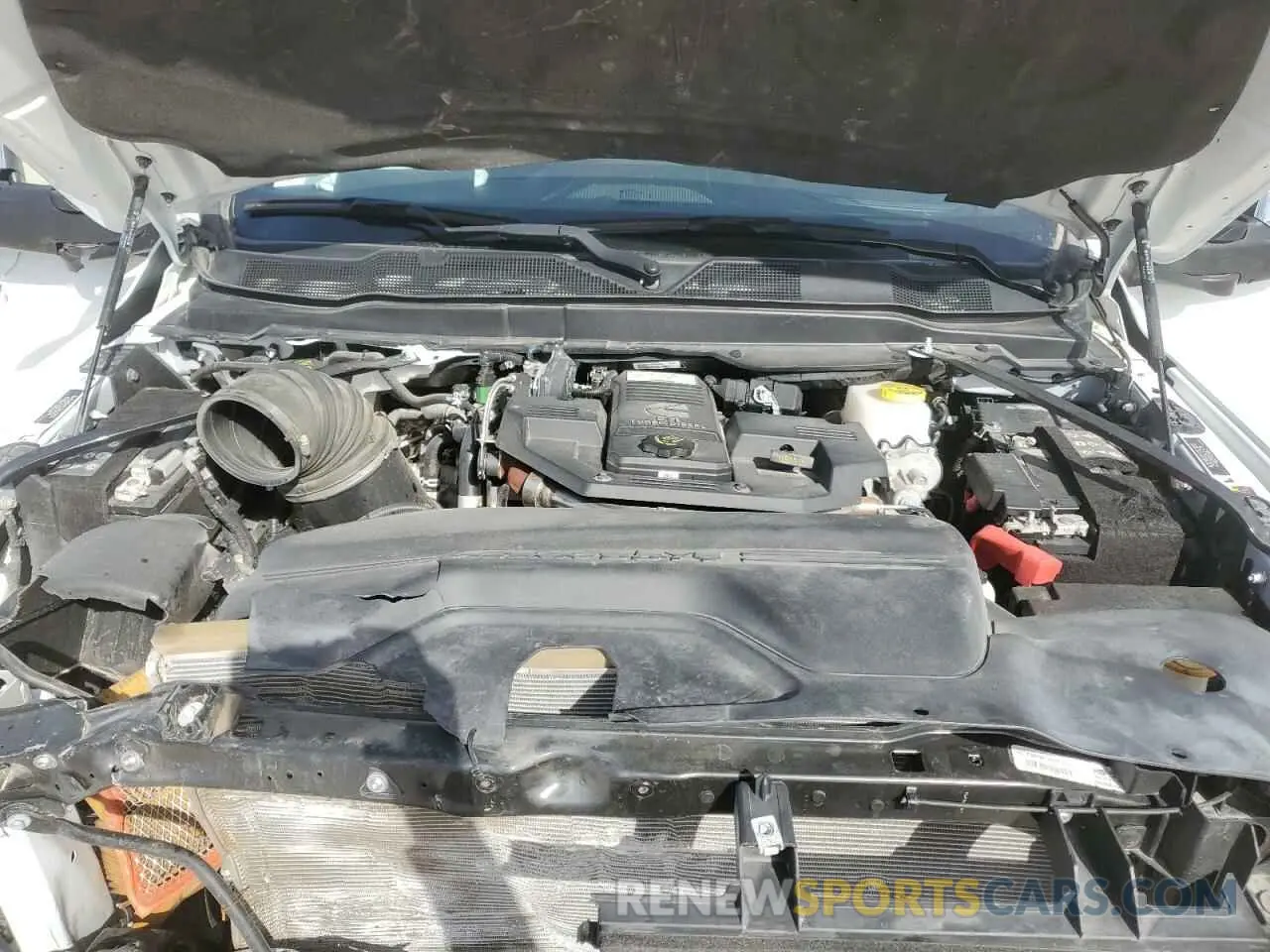 7 Photograph of a damaged car 3C6UR5SL4PG612906 RAM 2500 2023