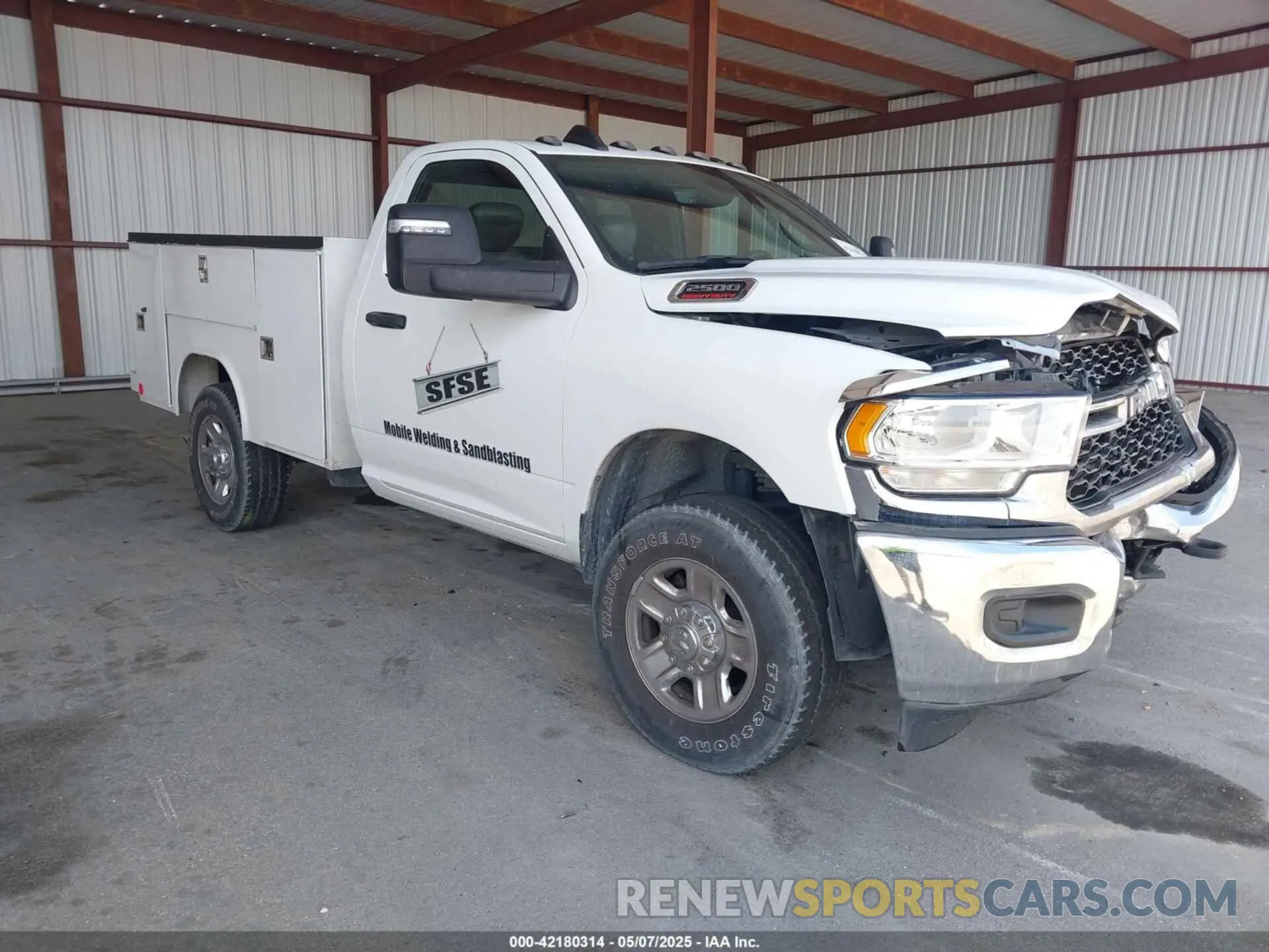 1 Photograph of a damaged car 3C7WR5AJ7PG567772 RAM 2500 2023