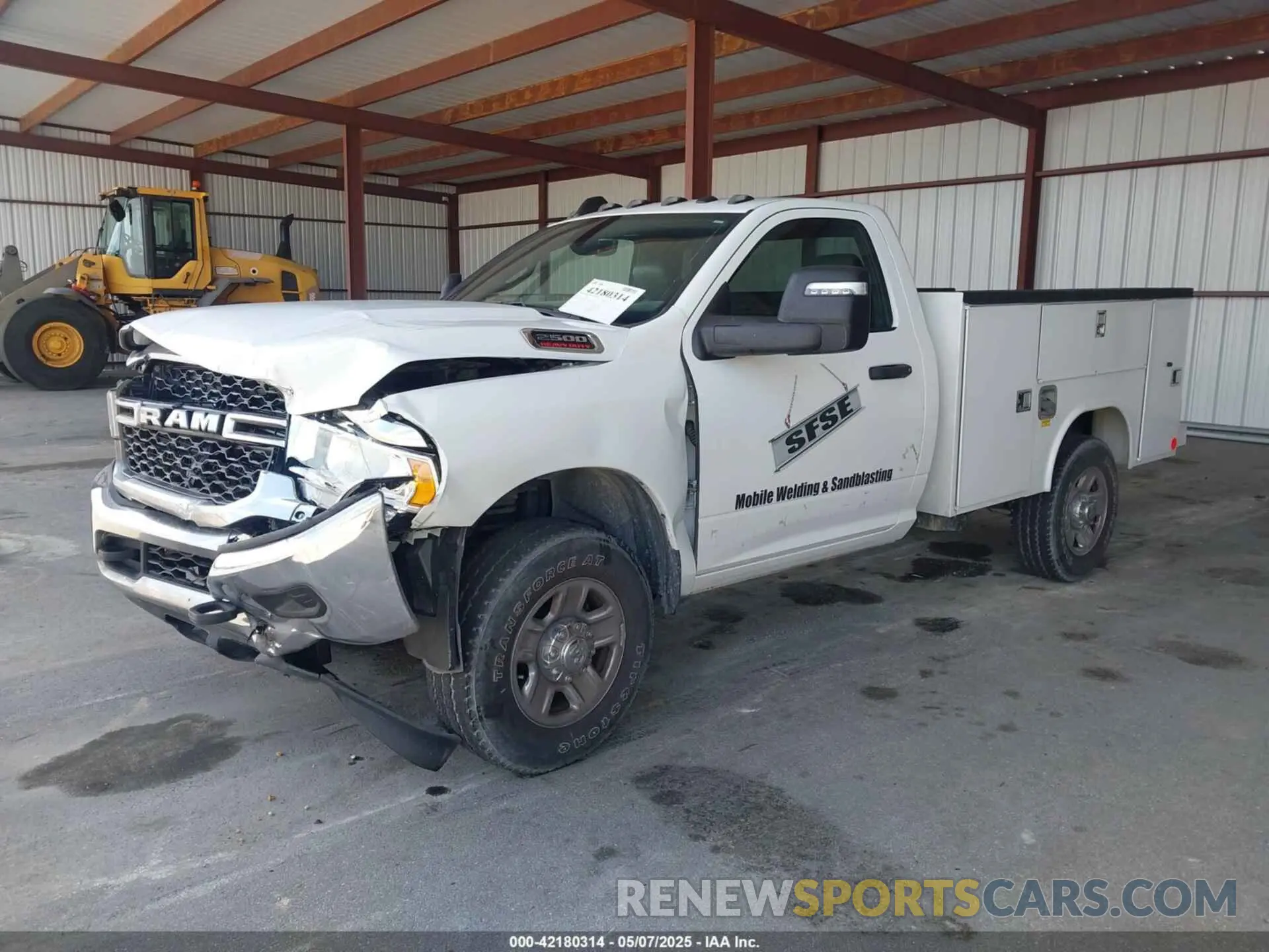 2 Photograph of a damaged car 3C7WR5AJ7PG567772 RAM 2500 2023