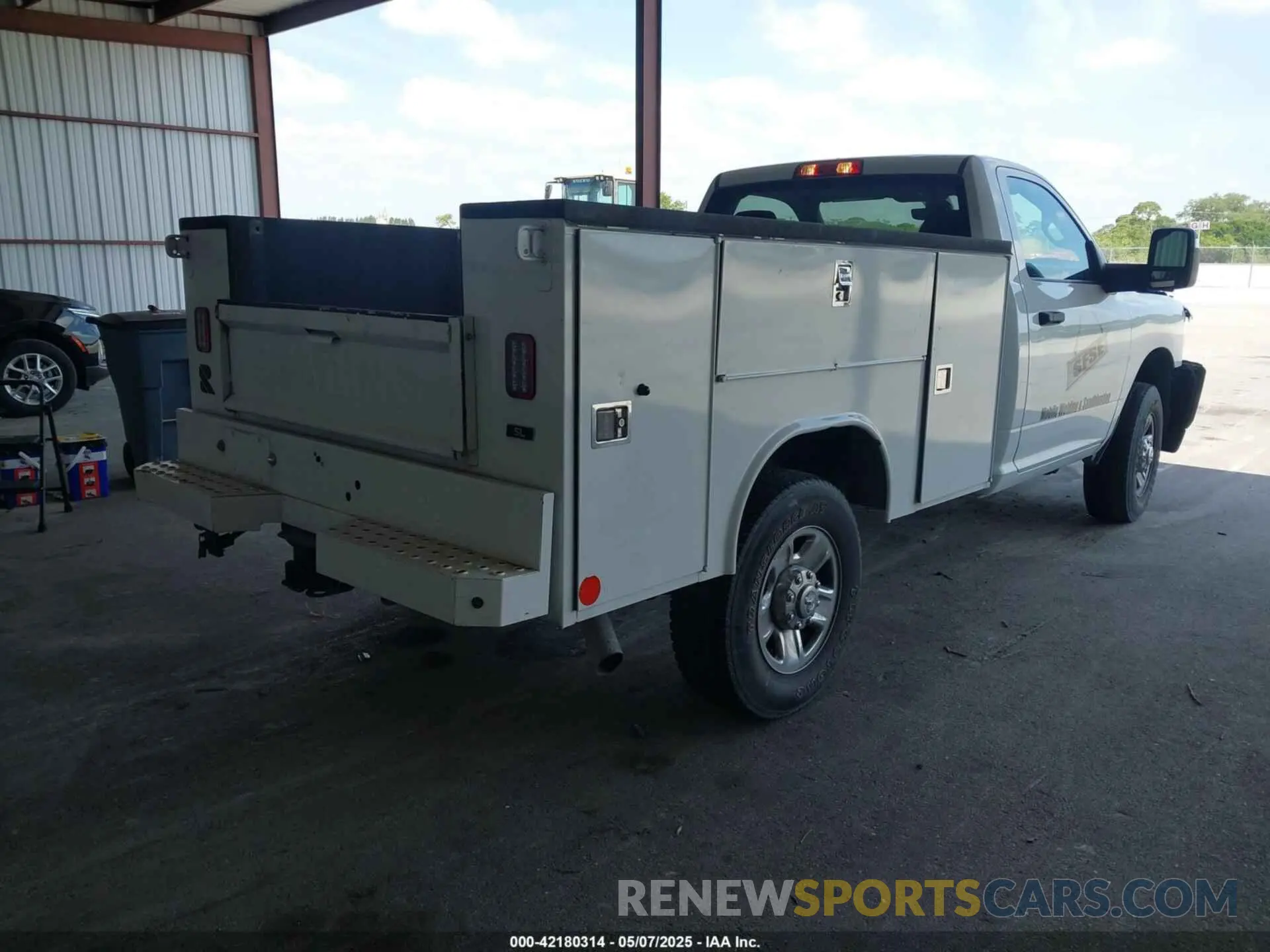 4 Photograph of a damaged car 3C7WR5AJ7PG567772 RAM 2500 2023