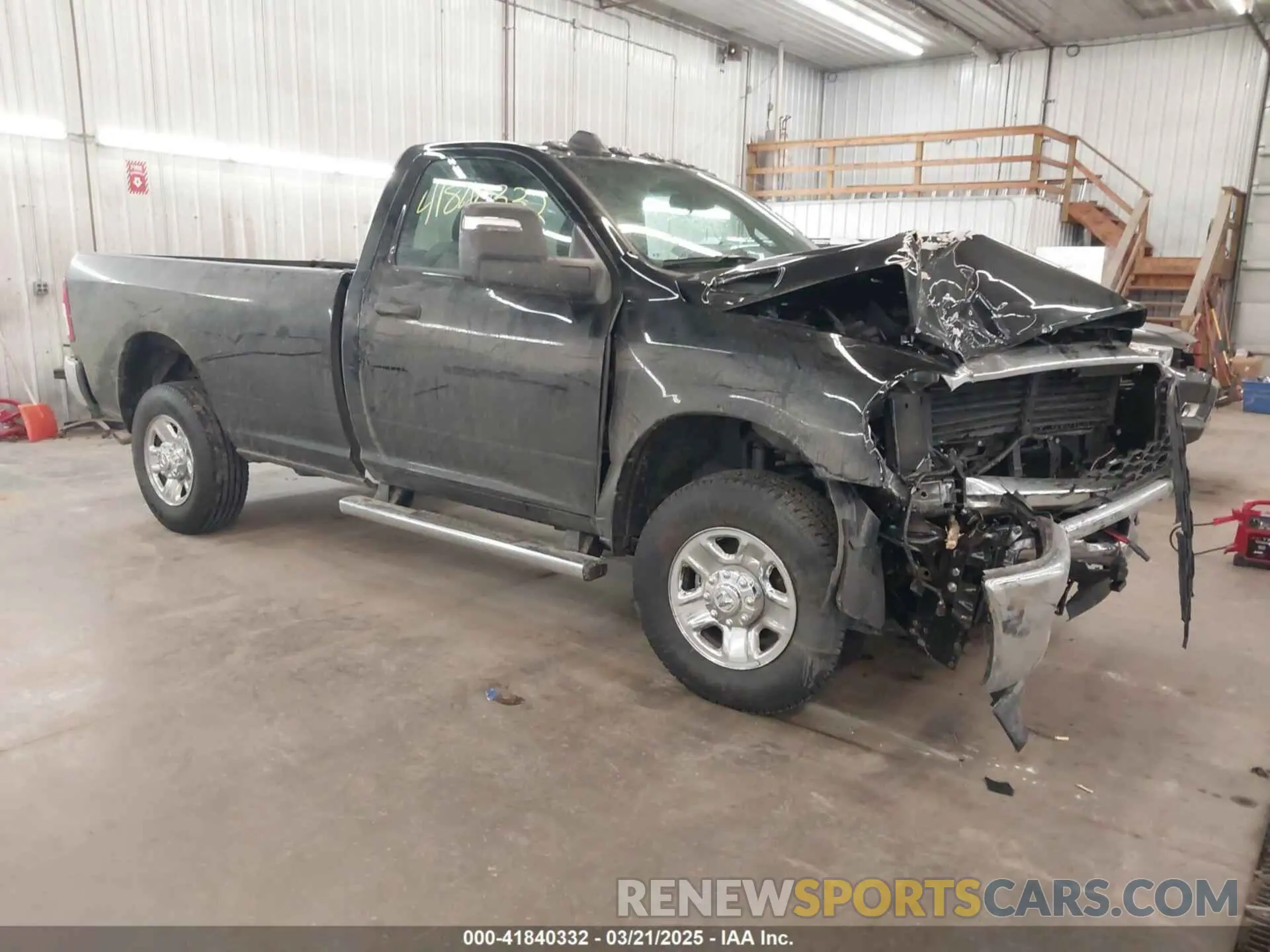 1 Photograph of a damaged car 3C6MR5AJ8RG298602 RAM 2500 2024