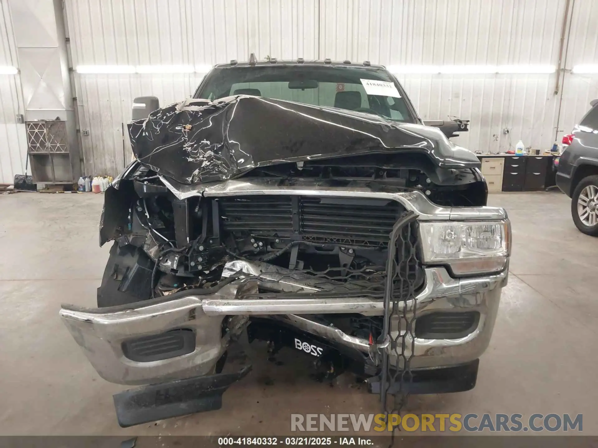 13 Photograph of a damaged car 3C6MR5AJ8RG298602 RAM 2500 2024