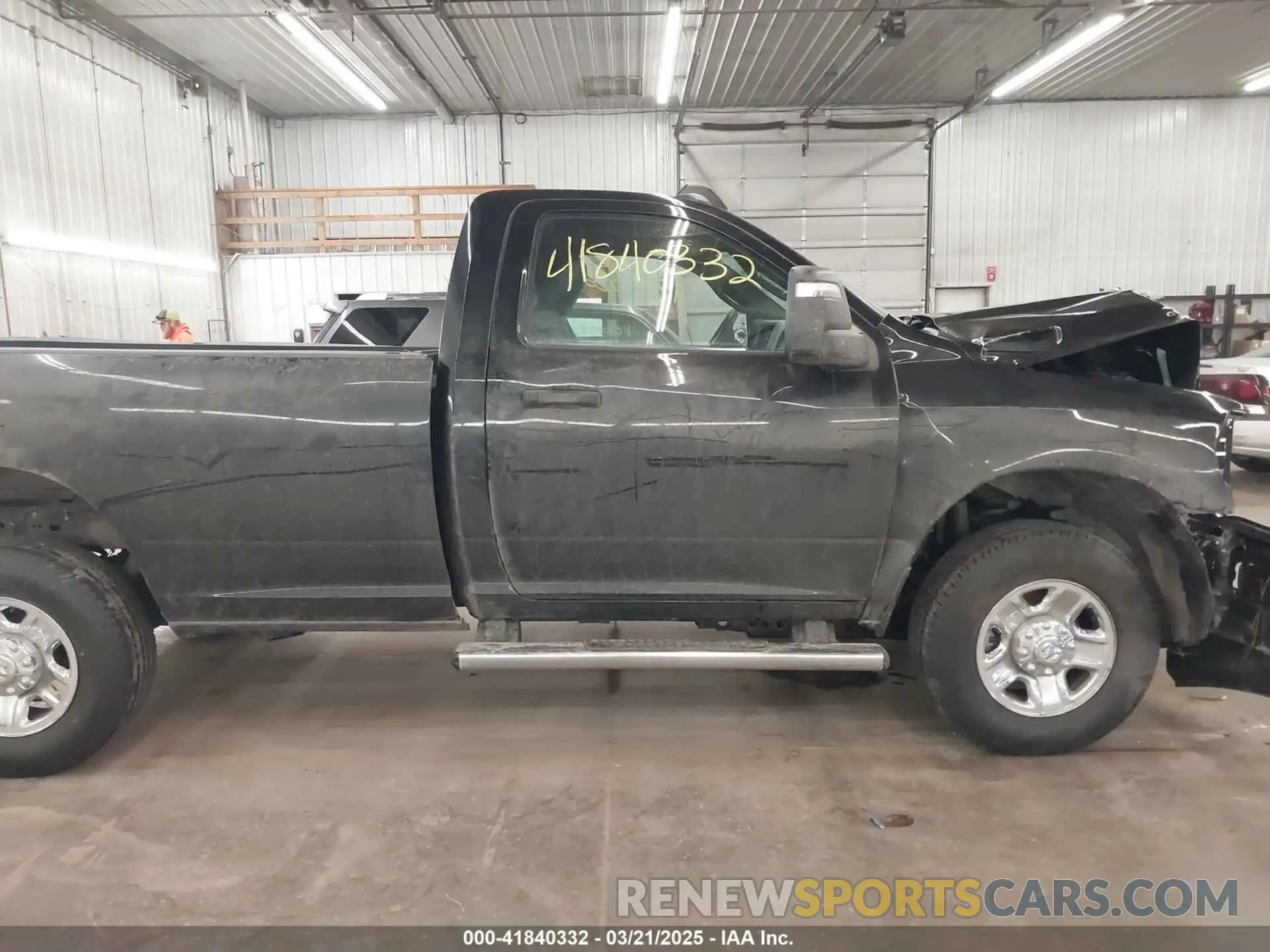 14 Photograph of a damaged car 3C6MR5AJ8RG298602 RAM 2500 2024