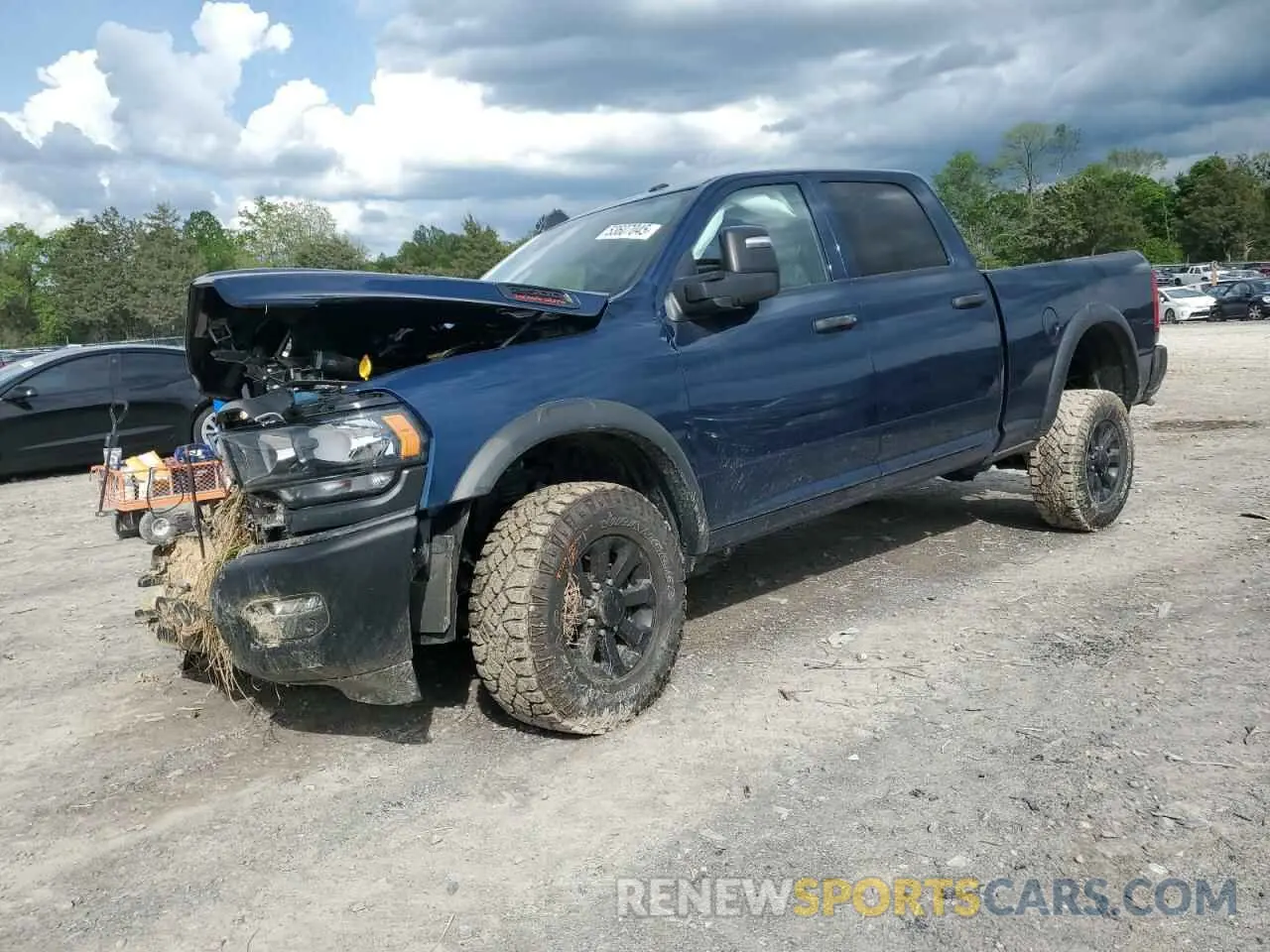 1 Photograph of a damaged car 3C6TR5CJ9RG330188 RAM 2500 2024