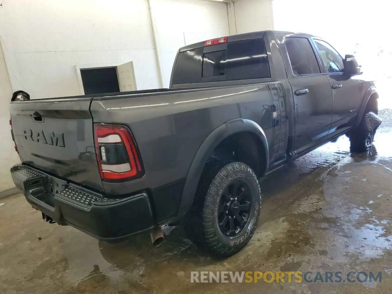 3 Photograph of a damaged car 3C6TR5EJ8RG130481 RAM 2500 2024